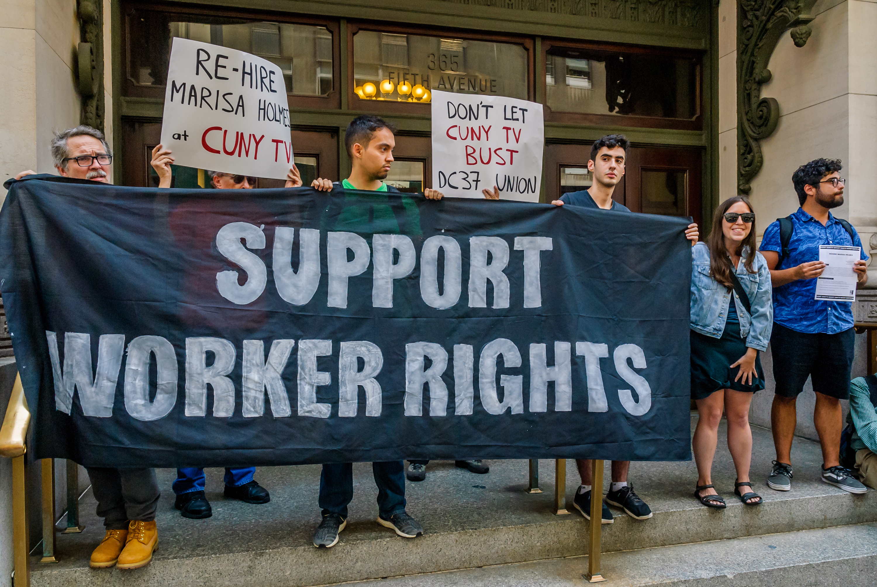 A July 2017 pro-union rally outside CUNY Graduate Center in Manhattan. (CREDIT: Erik McGregor/Pacific Press/LightRocket via Getty Images)