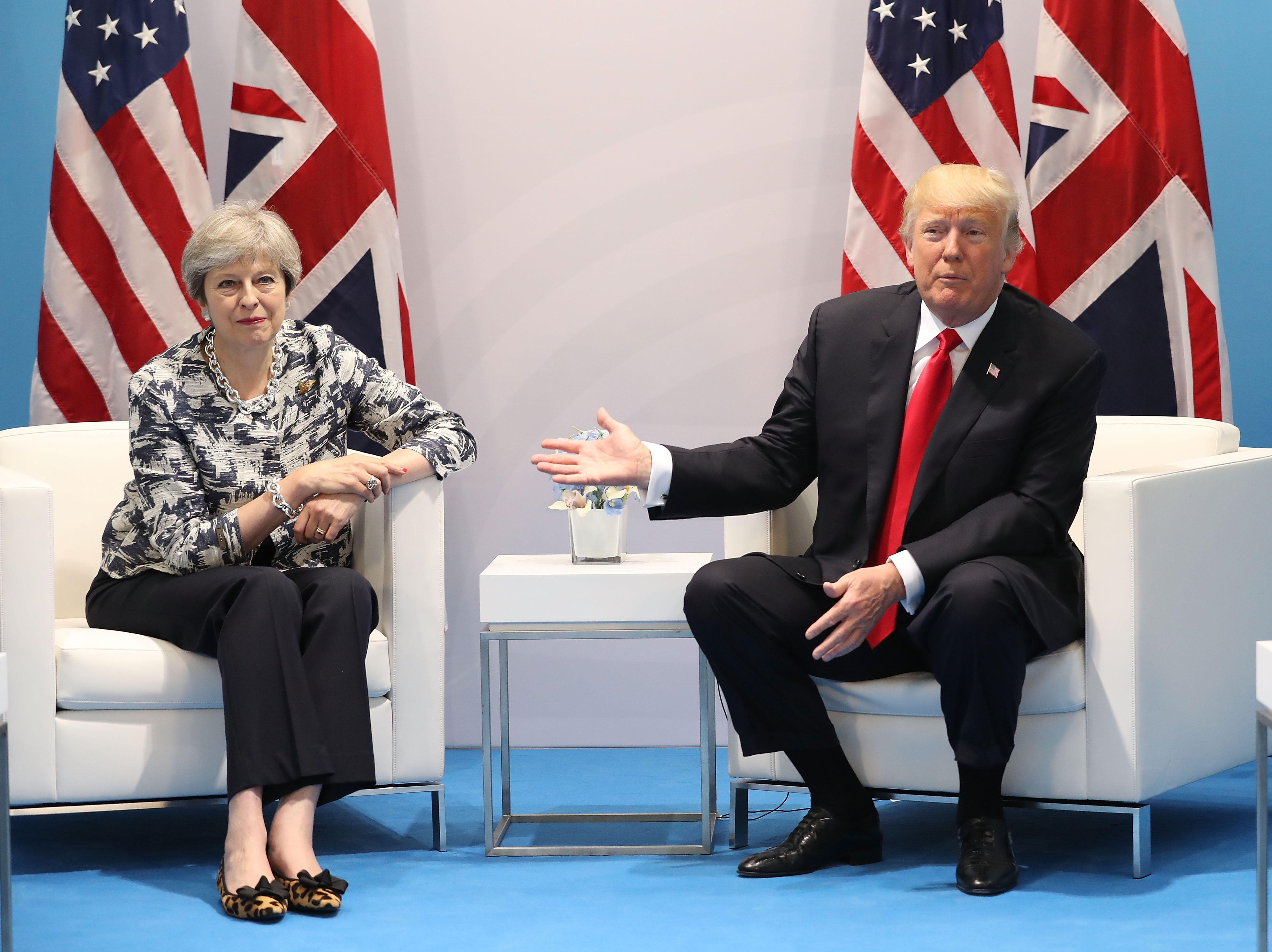 FILE PICTURE: British Prime Minister Theresa May meets U.S President Donald Trump during the G20 summit on July 8, 2017 in Hamburg, Germany. Leaders of the G20 group of nations are meeting for the July 7-8 summit. (Photo by Matt Cardy/Getty Images)