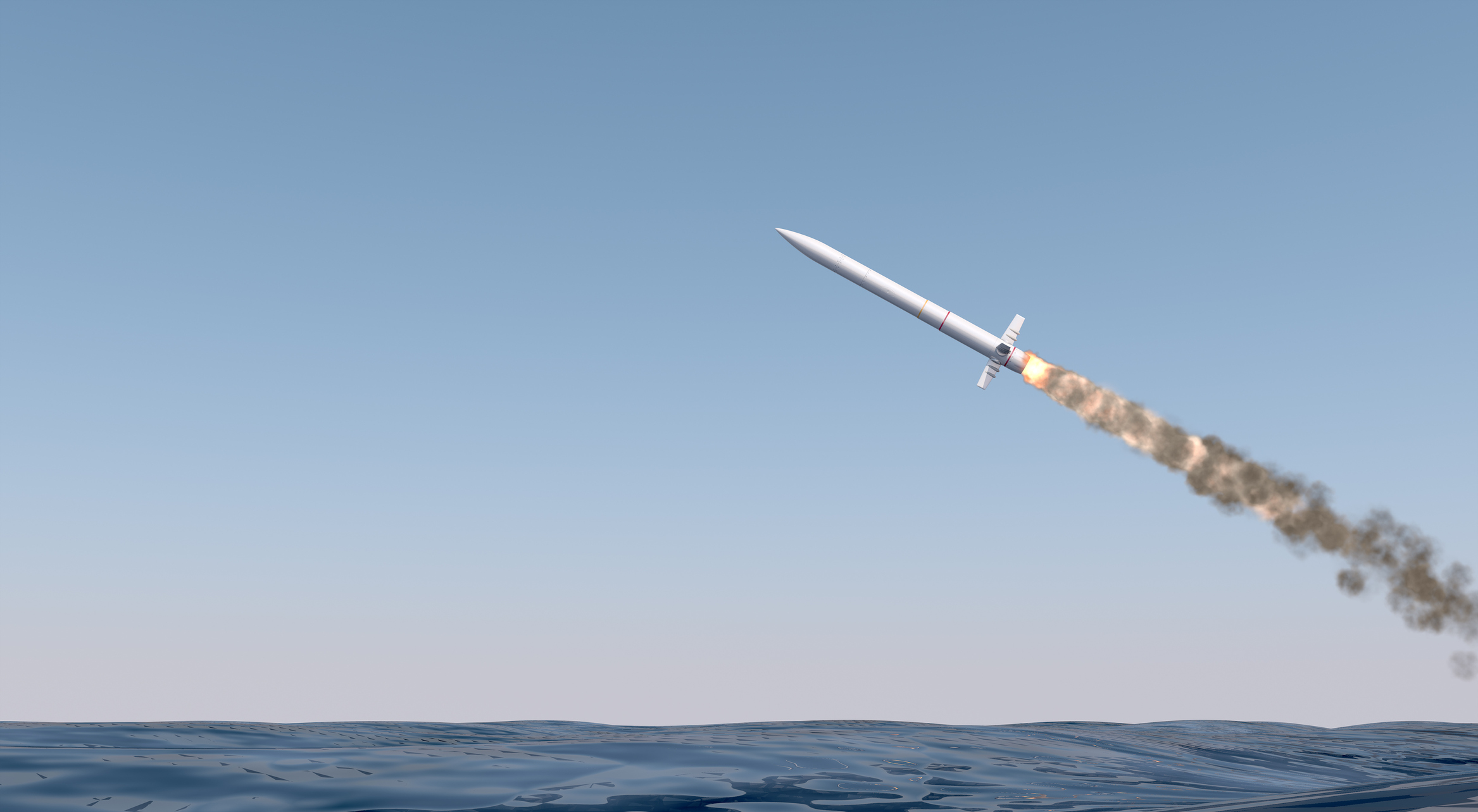 An intercontinental ballistic missile launching across the ocean on a blue sky background - 3D render (CREDIT: Getty Images)