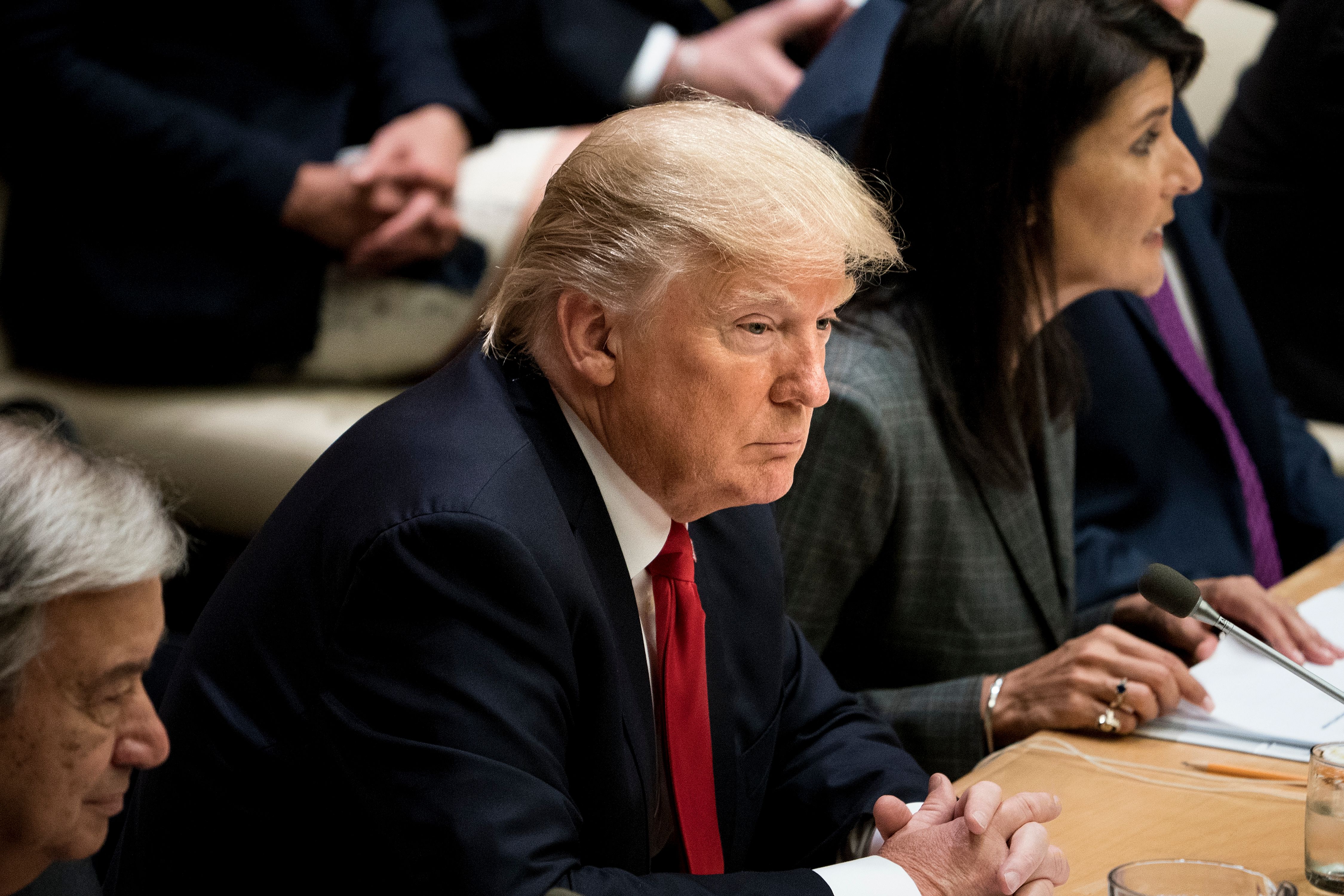 President Donald Trump and Ambassador Nikki Haley listen during a meeting on United Nations Reform at the UN headquarters on September 18, 2017 in New York City. CREDIT: Brendan Smialowski/ AFP Photo/Getty Images.
