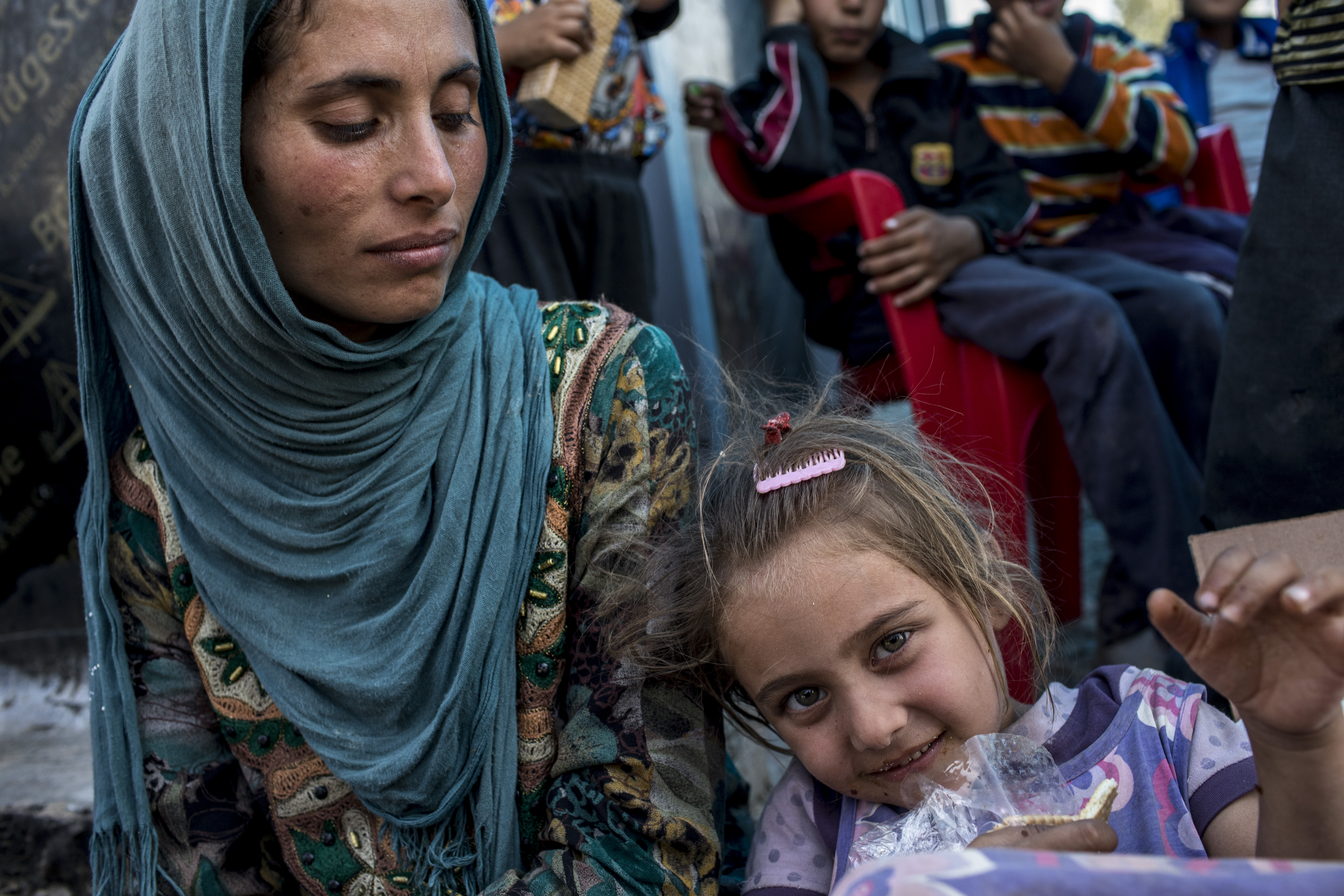Families arrive at IDP camps from the city of Hawija and surrounding villages in the Dibis District in Kirkuk, Iraq. (CREDIT: Younes Mohammad/Getty Images)