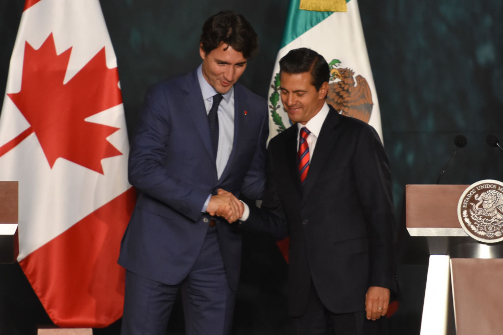 Prime Minister of Canada Justin Trudeau and Mexican President Enrique Pena Nieto during a press conference to speak for the negotiations of NAFTA between Mexico and Canada at National Palace on October 12, 2017 in Mexico City, Mexico. (CREDIT: Carlos Tischler/NurPhoto via Getty Images)