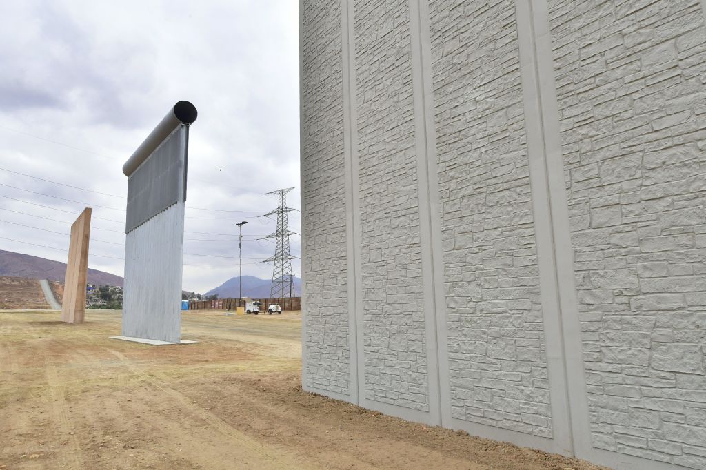 Prototypes of US President Donald Trump's proposed border wall stand near the US-Mexico border on November 1, 2017 in San Diego, California.
Credit: FREDERIC J. BROWN/AFP/Getty Images