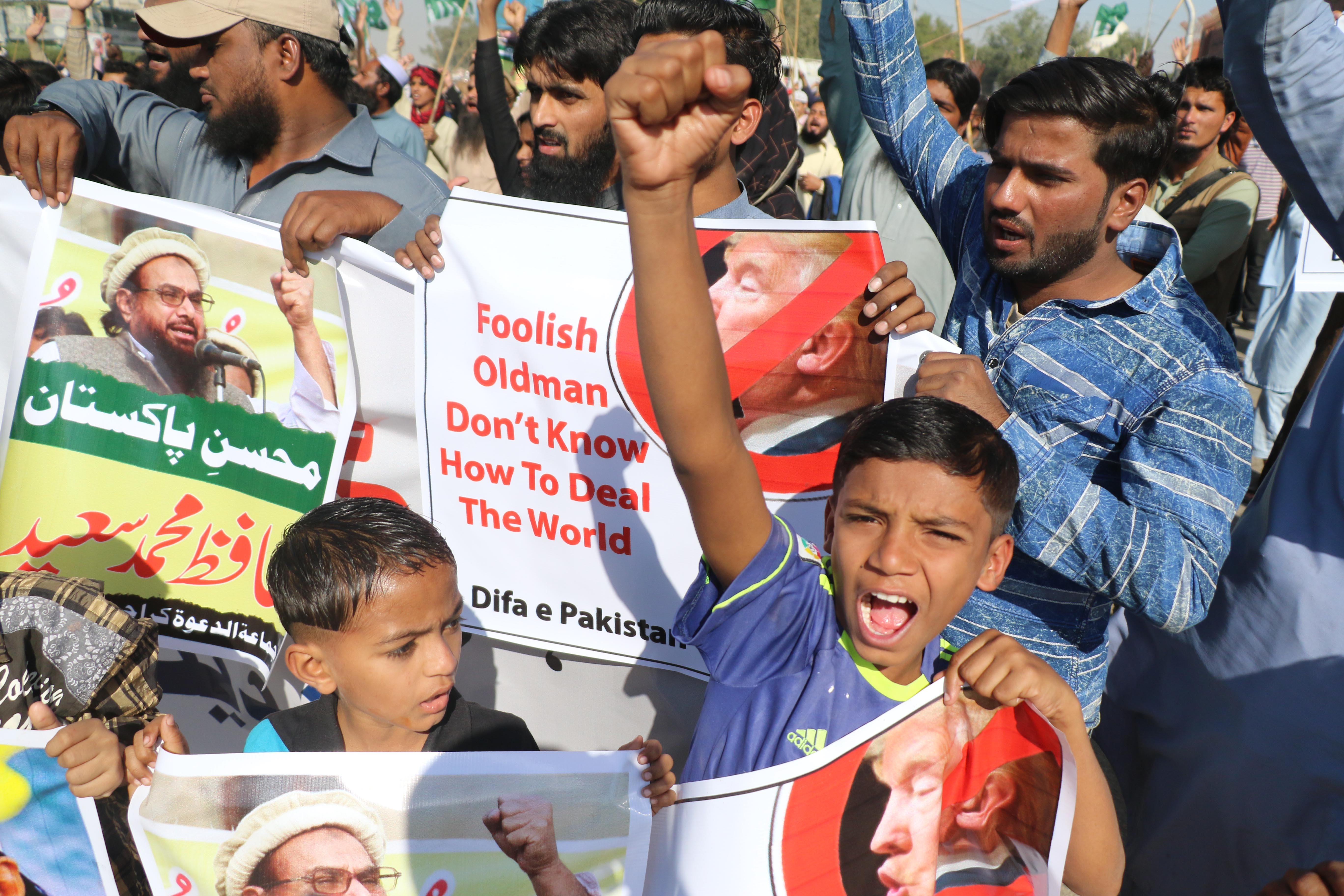 Supporters of Difa-e-Pakistan Council chant slogans during a protest against US President Donald Trump's statement against Pakistan in Karachi on January 02,2018. CREDIT: Sabir Mazhar/Anadolu Agency via Getty Images.