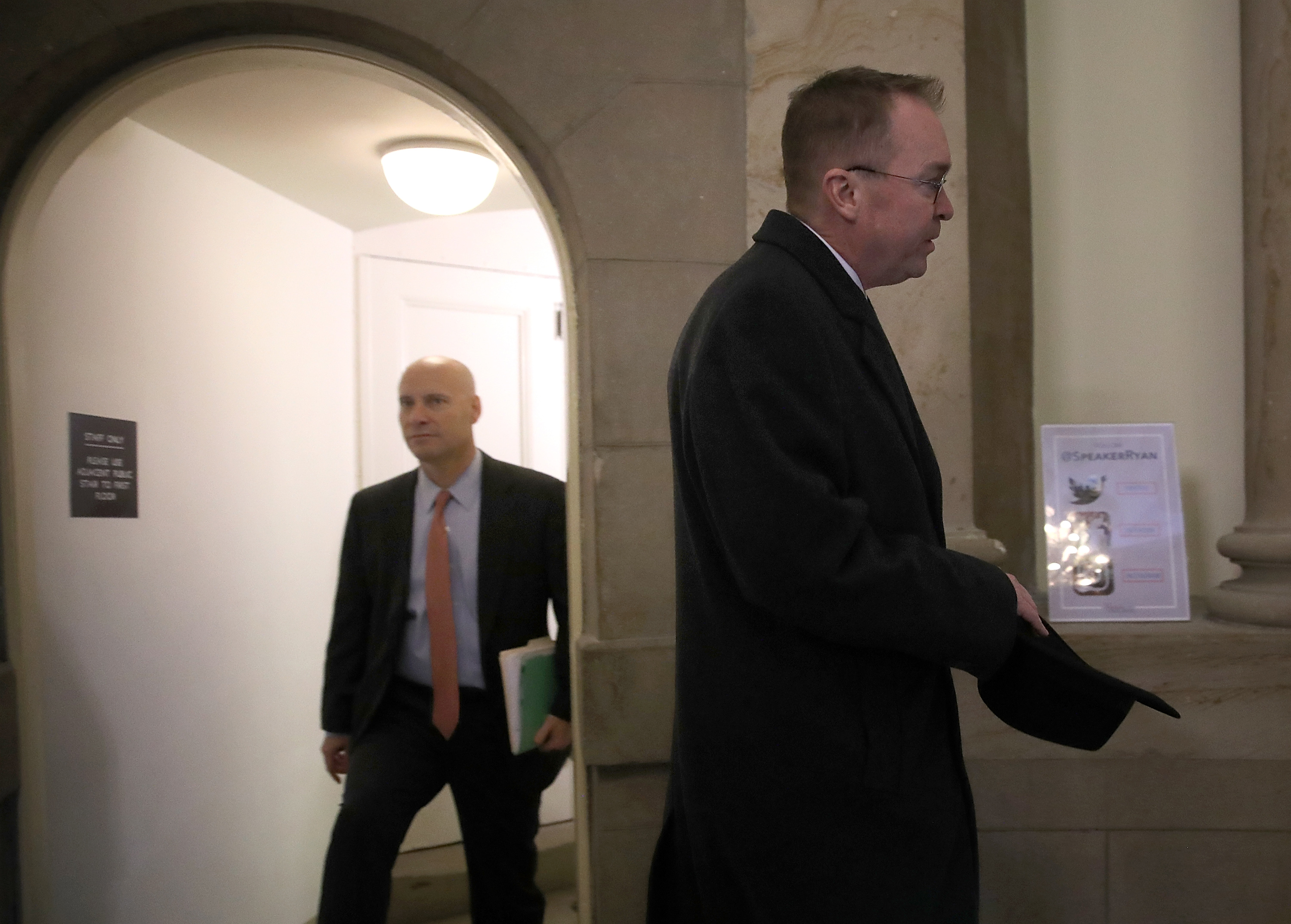 Mick Mulvaney, hat in hand, currently serves as both White House Budget Director and acting head of the Consumer Financial Protection Bureau -- an agency he doesn't believe should exist. CREDIT: Win McNamee/Getty Images