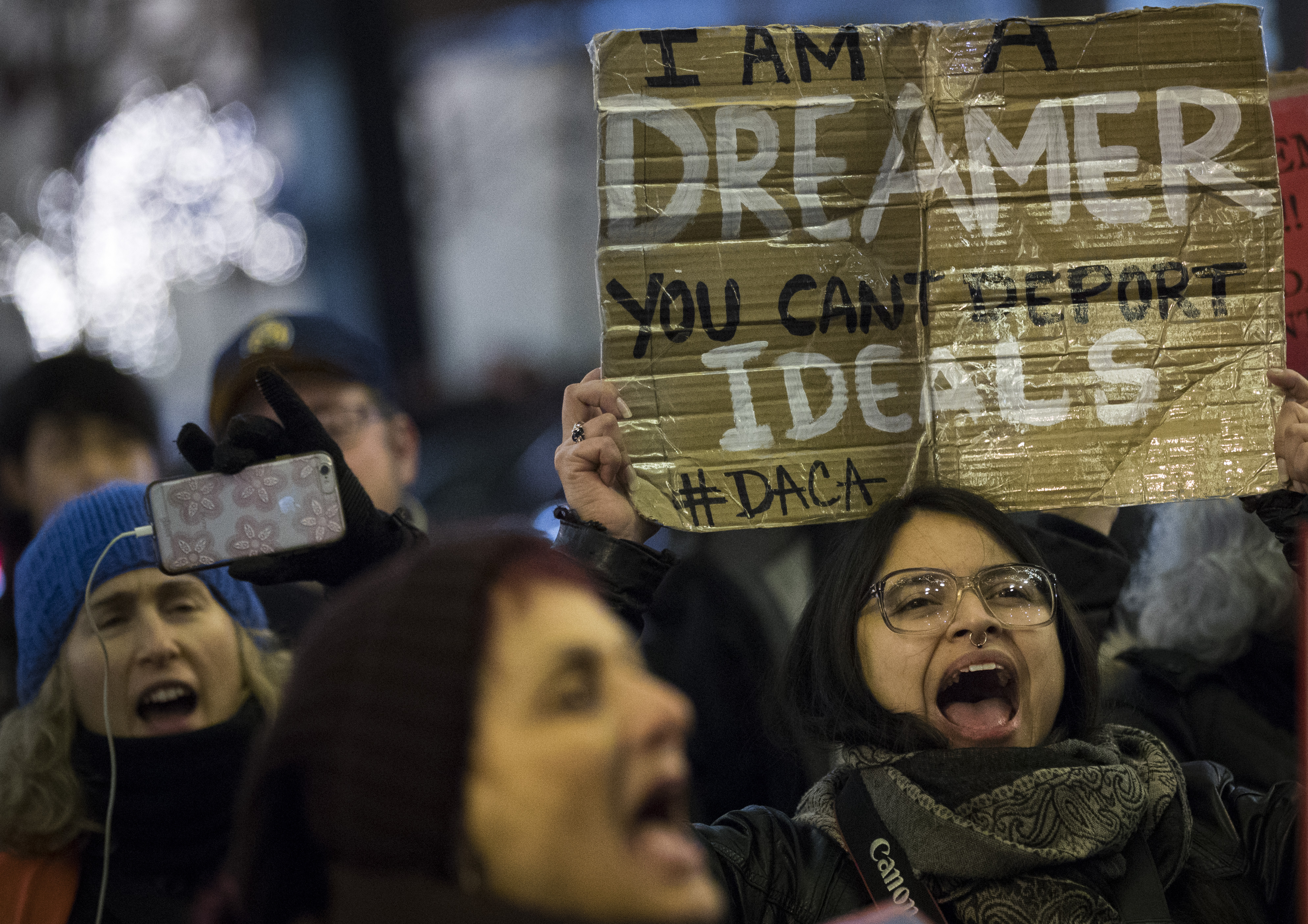 NEW YORK, NY - JANUARY 10: Activists rally for the passage of a "clean" Dream Act, one without additional security or enforcement measures, outside the New York office of Sen. Chuck Schumer (D-NY), January 10, 2018 in New York City. The Dream Act, first introduced in 2001, is a proposed bill that would allow undocumented immigrants who came to the country as children to stay in the country legally. (Photo by Drew Angerer/Getty Images)