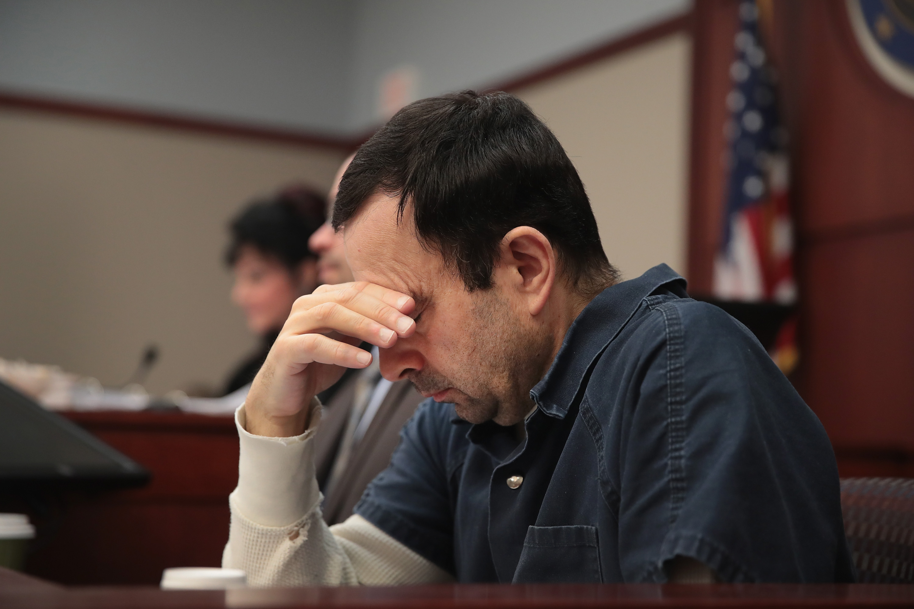 LANSING, MI - JANUARY 17: Larry Nassar listens to victim impact statements during his sentencing hearing.
CREDIT: Scott Olson/Getty Images