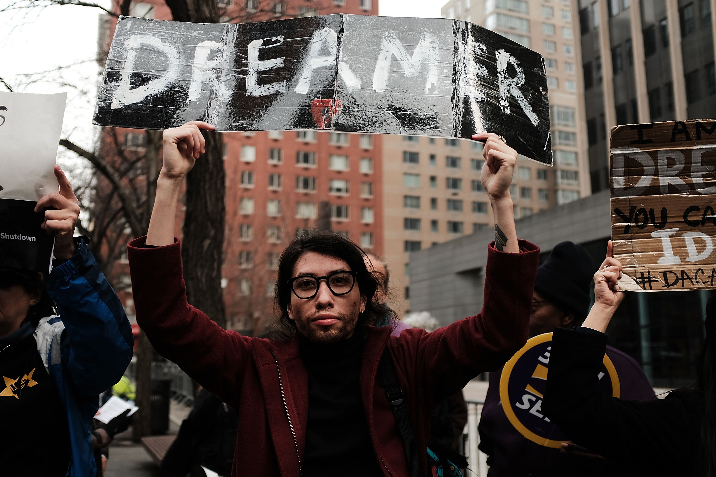 NEW YORK, NY - JANUARY 22: Demonstrators, many of them recent immigrants to America, protest the government shutdown and the lack of a deal on DACA (Deferred Action for Childhood Arrivals) outside of Federal Plaza on January 22, 2018 in New York City. (Photo by Spencer Platt/Getty Images)