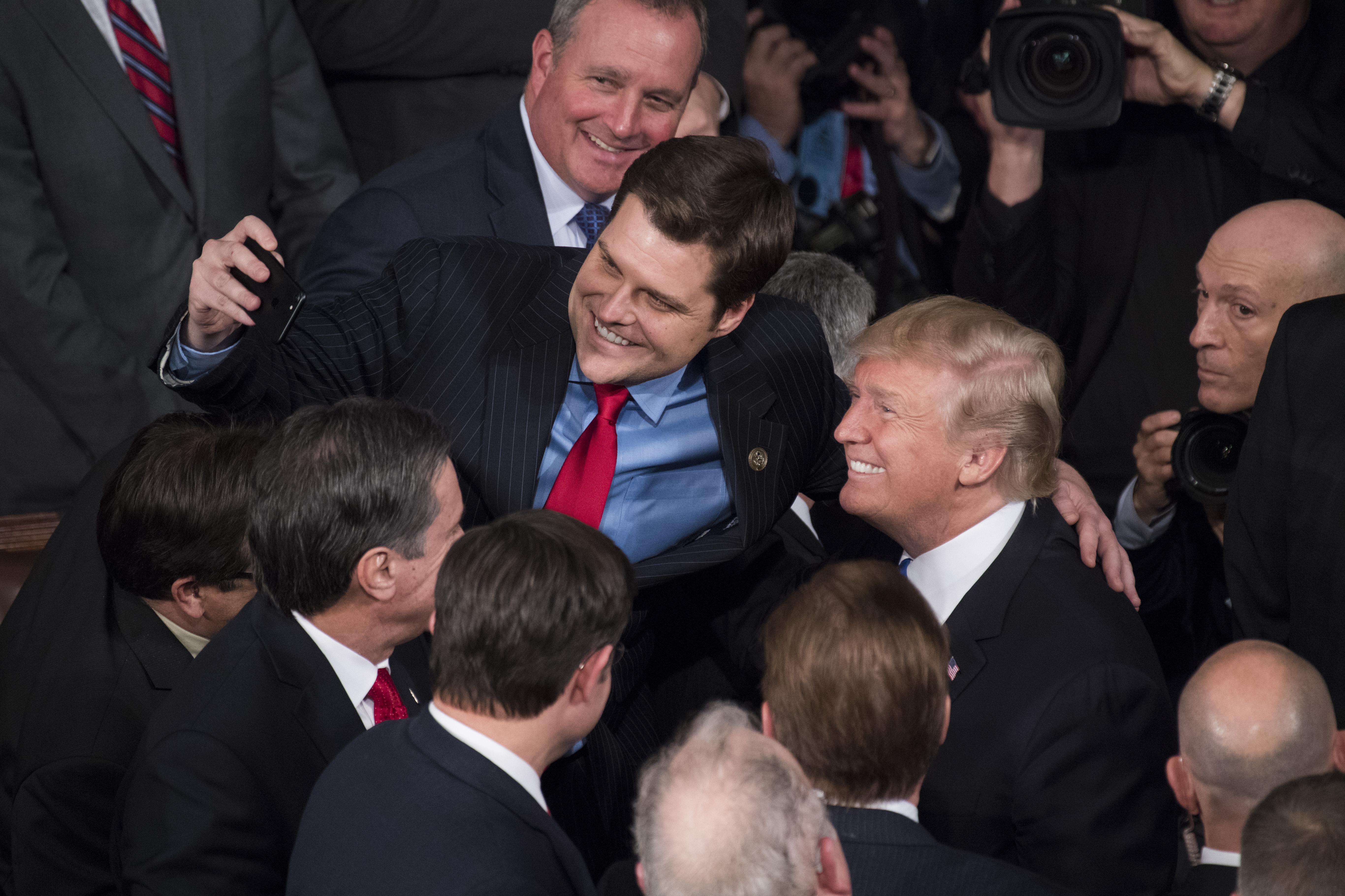 gaetz and trump post for a selfie following the state of the union speech on tuesday. (credit: Tom Williams/CQ Roll Call)