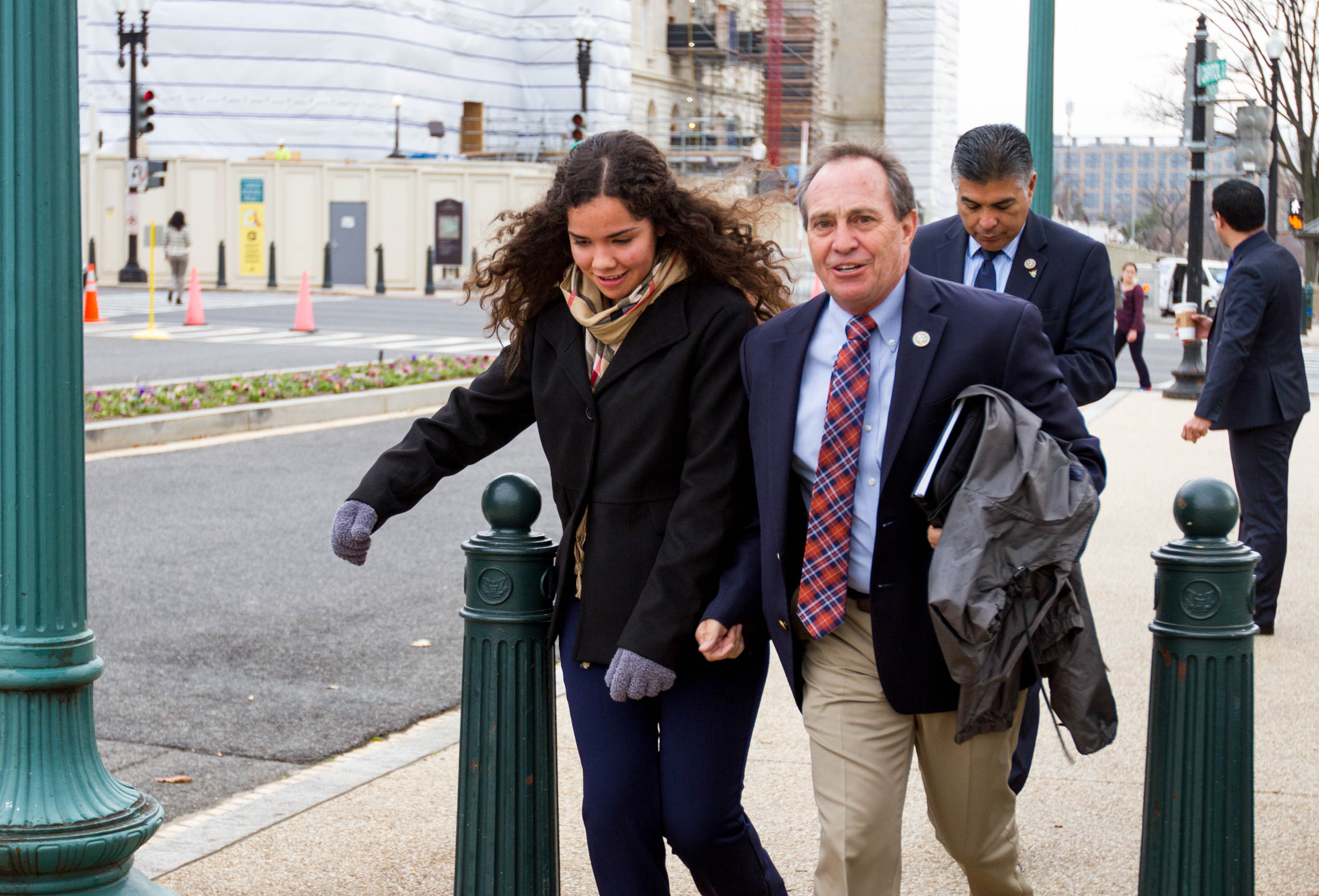 Maria jogs with Rep. Ed Perlmutter (D-CO) on his way to a vote on Dec. 5, 2017 outside the U.S. Capitol building. (Credit: Megan Janetsky)