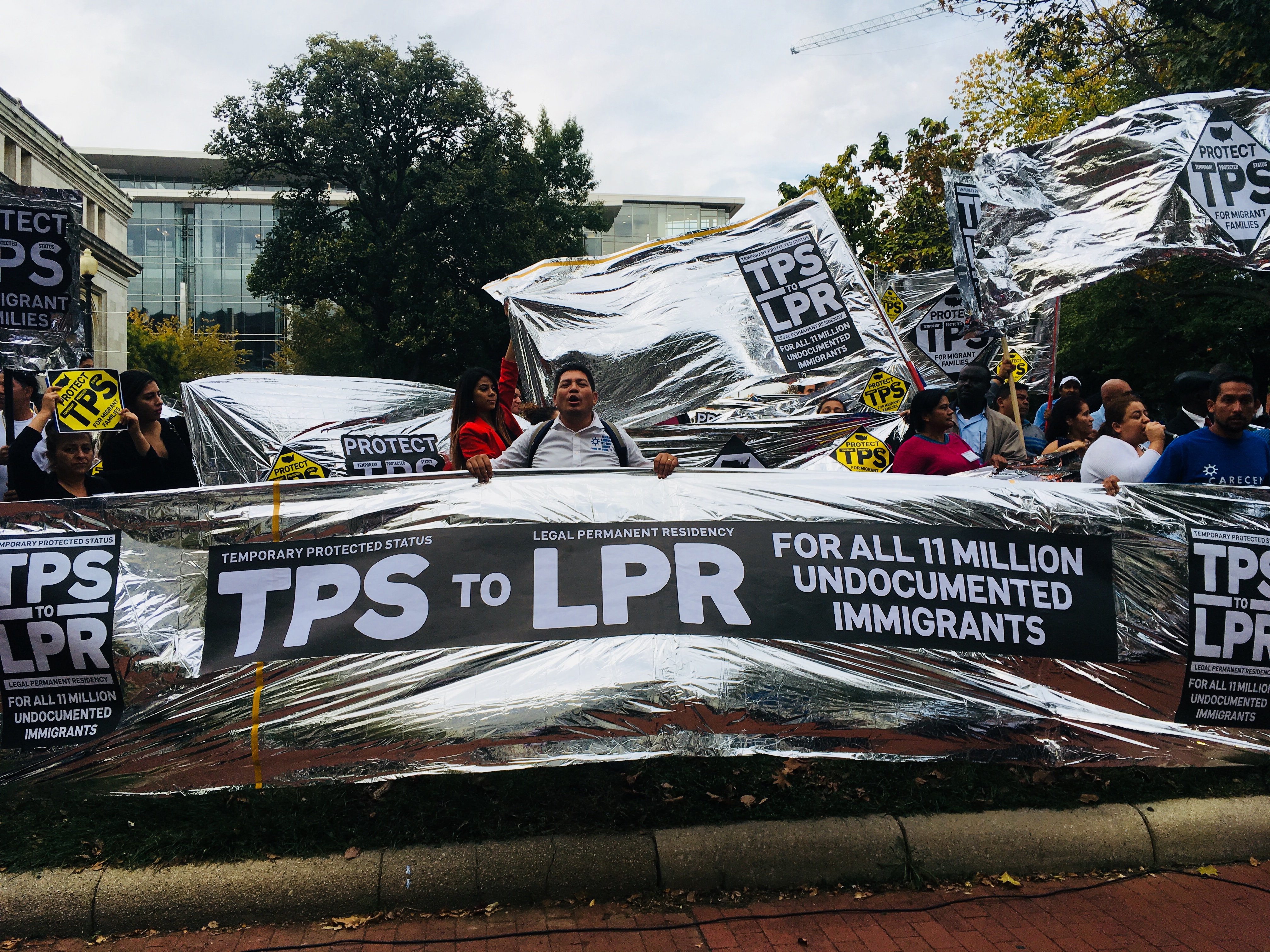 Advocates take to the streets in Washington, D.C. in October 2017 to call on Congress to help Temporary Protected Status (TPS) beneficiaries. (CREDIT: Esther Y. Lee)