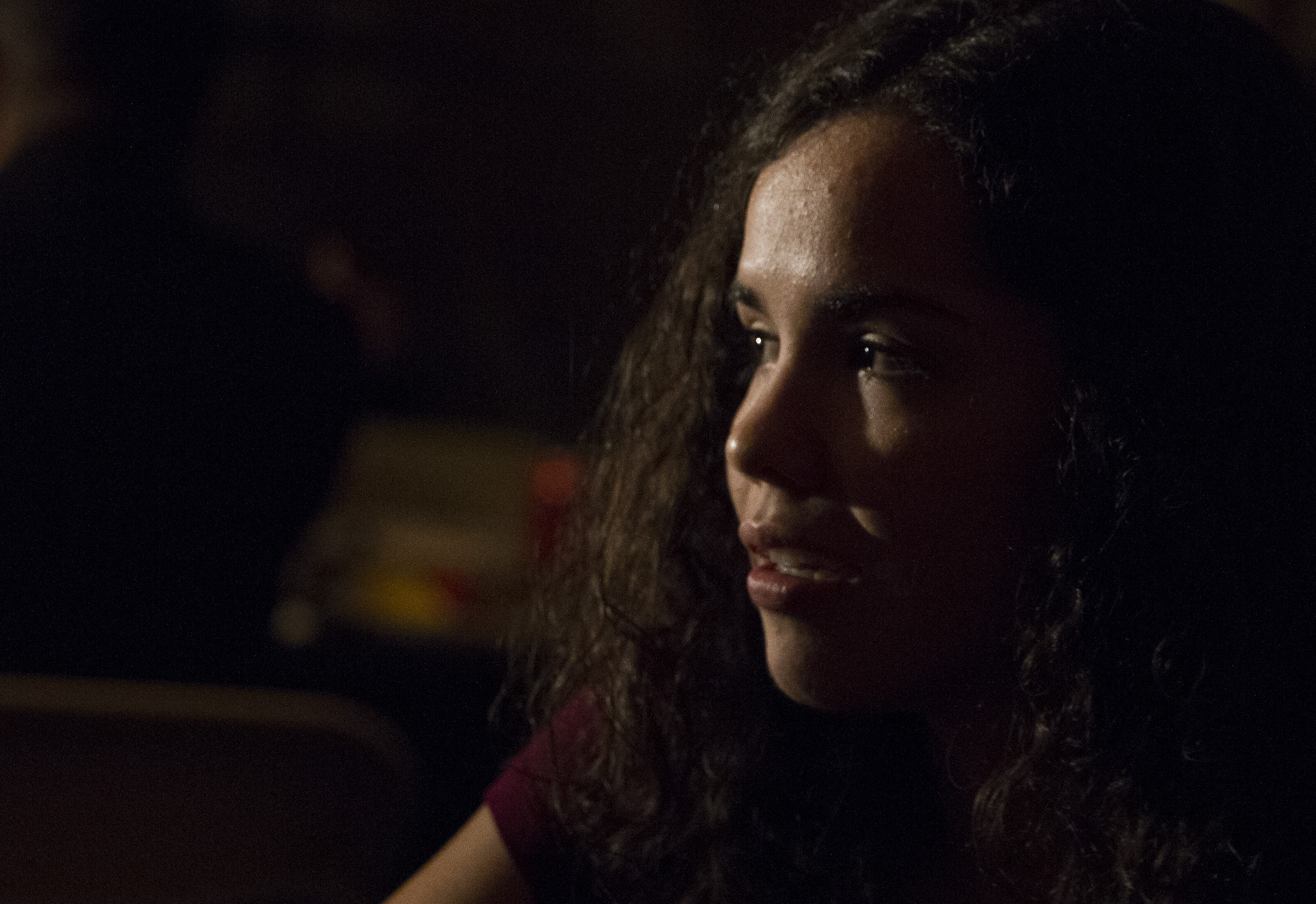 Maria Pena, one of Arizona's 27,865 DACA recipients sits with her friends on Nov. 11, 2017 at her Paradise Valley home, where she's lived for almost half of her life. (Credit: Megan Janetsky)