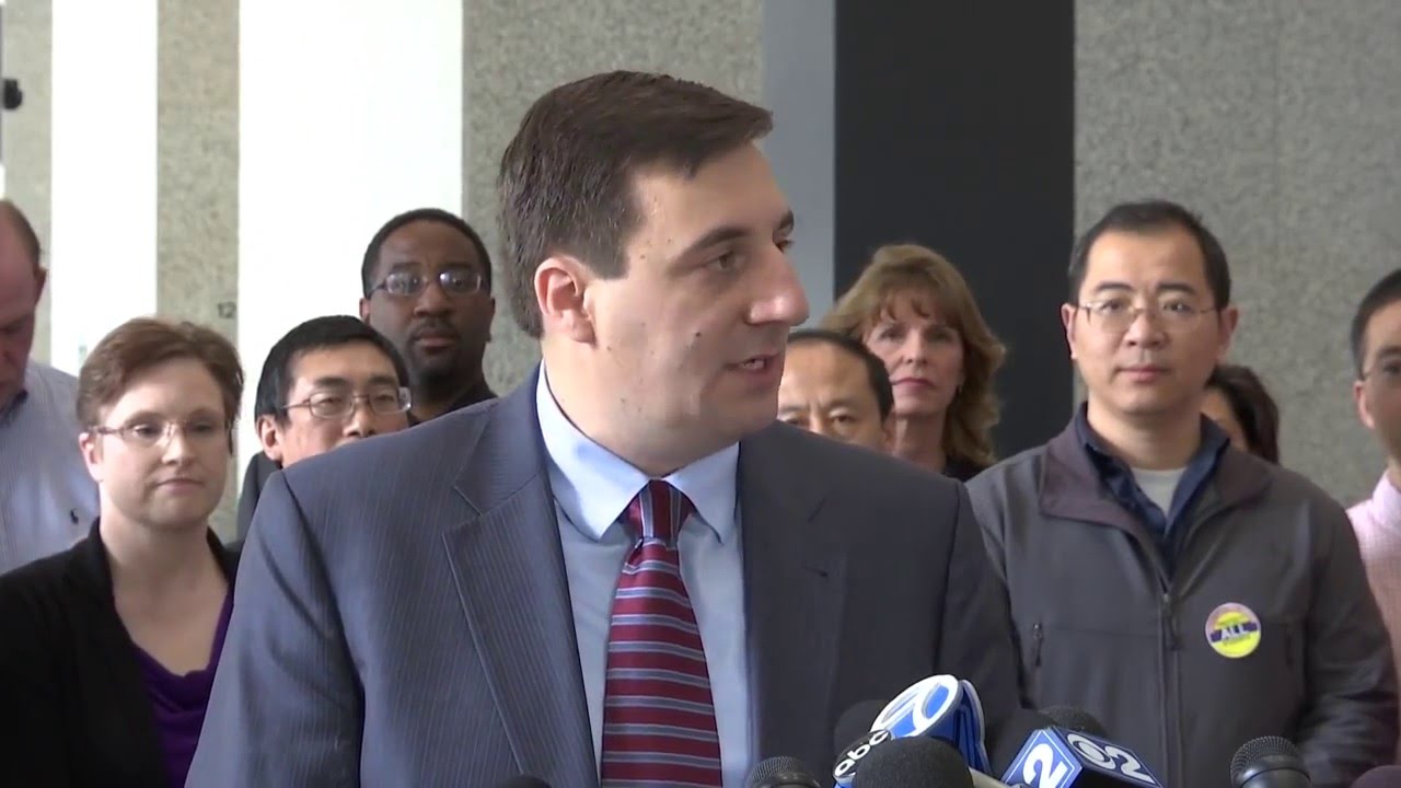 Alliance Defending Freedom's Jeremy Tedesco standing with District 211 parents when they filed their lawsuit in 2016. CREDIT: YouTube/Alliance Defending Freedom.