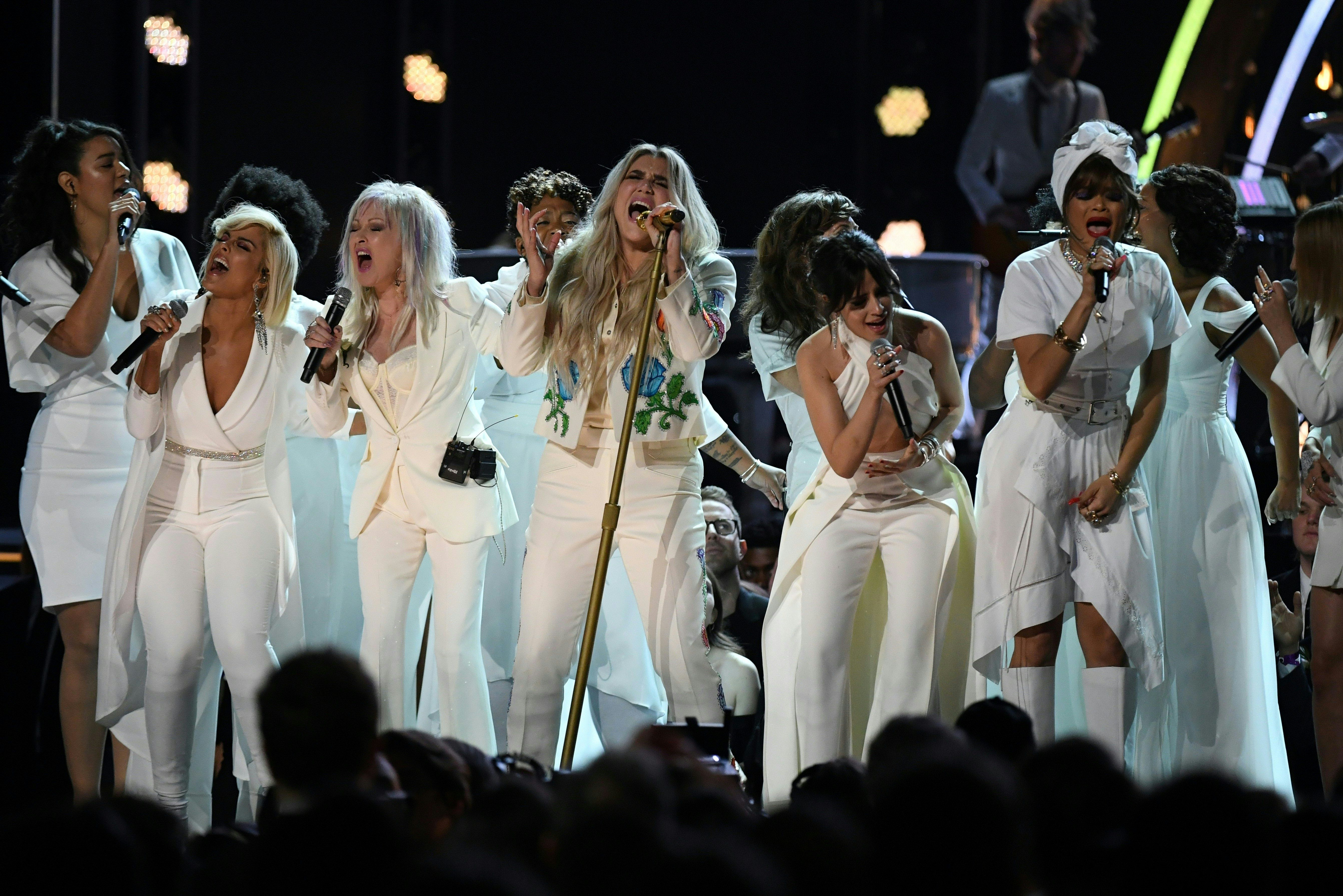 Kesha (C) performs with Bebe Rexha, Cindy Lauper, Camila Cabello, during the 60th Annual Grammy Awards show on January 28, 2018, in New York. CREDIT: TIMOTHY A. CLARY/AFP/Getty Images