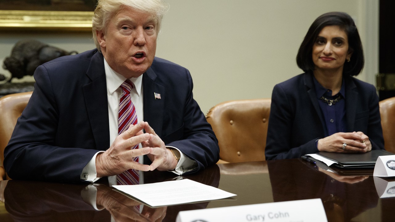 Administrator of the Centers for Medicare and Medicaid Services Seema Verma listens at right as President Donald Trump speaks during a meeting on women in healthcare, Wednesday, March 22, 2017, in the Roosevelt Room of the White House in Washington. (AP Photo/Evan Vucci)