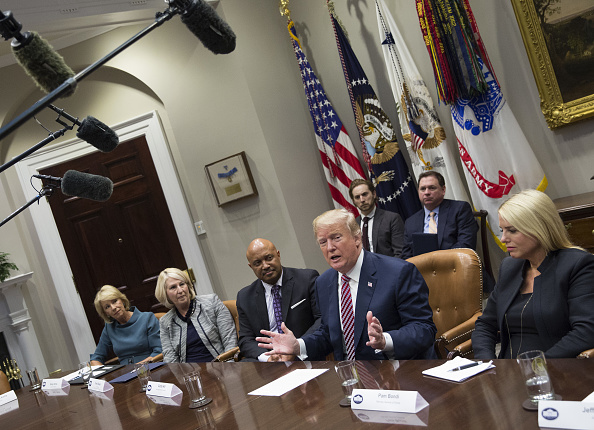 Trump seaks during a meeting with local and state officials on school safety at the White House. CREDIT: Chris Kleponis/Pool via Bloomberg