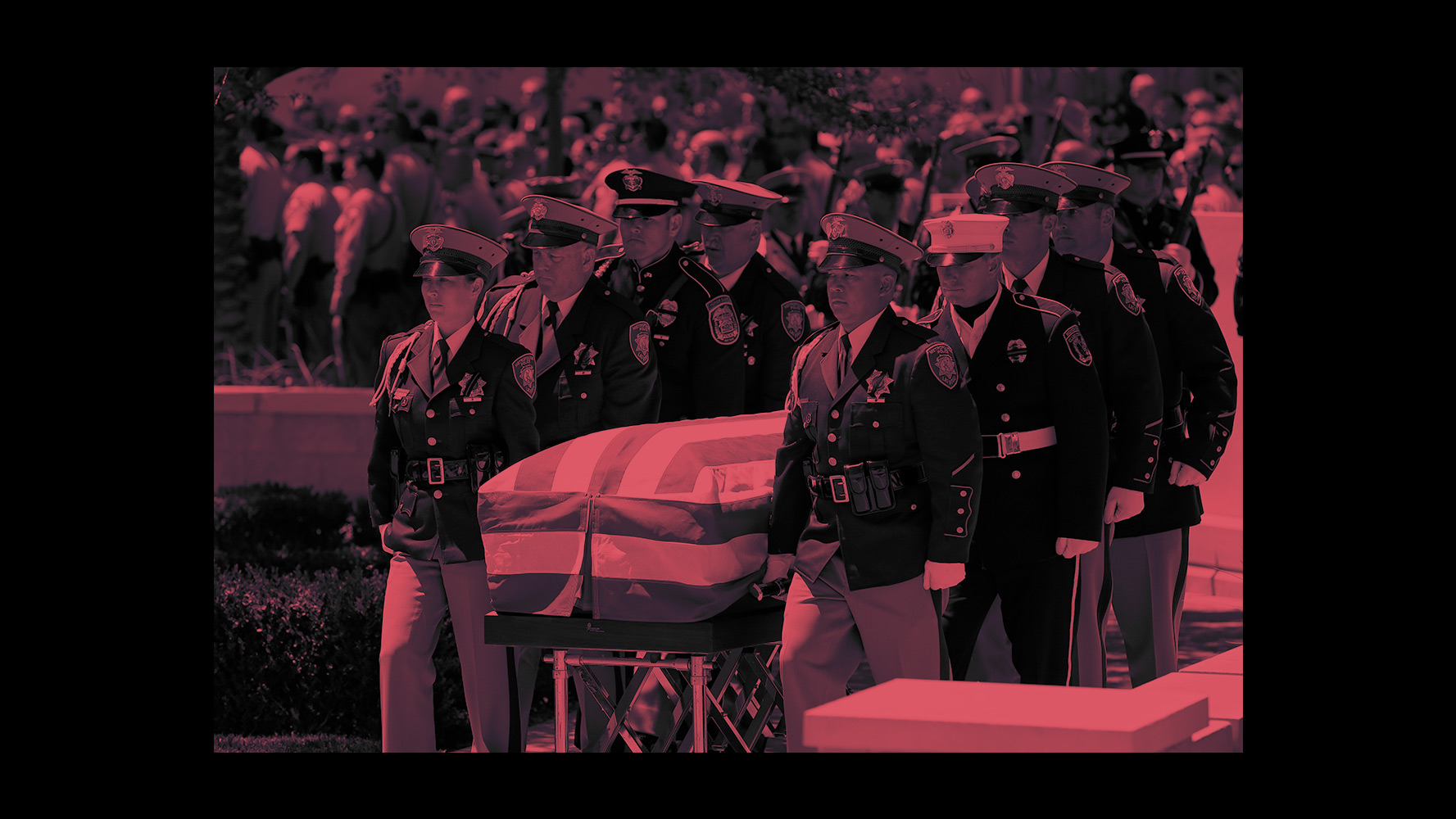 Pallbearers move the casket of Las Vegas Metropolitan Police Officer Alyn Beck during a memorial at The Smith Center for the Performing Arts Saturday, on June 14, 2014 in Las Vegas, Nevada. (Getty Images / Diana Ofosu)