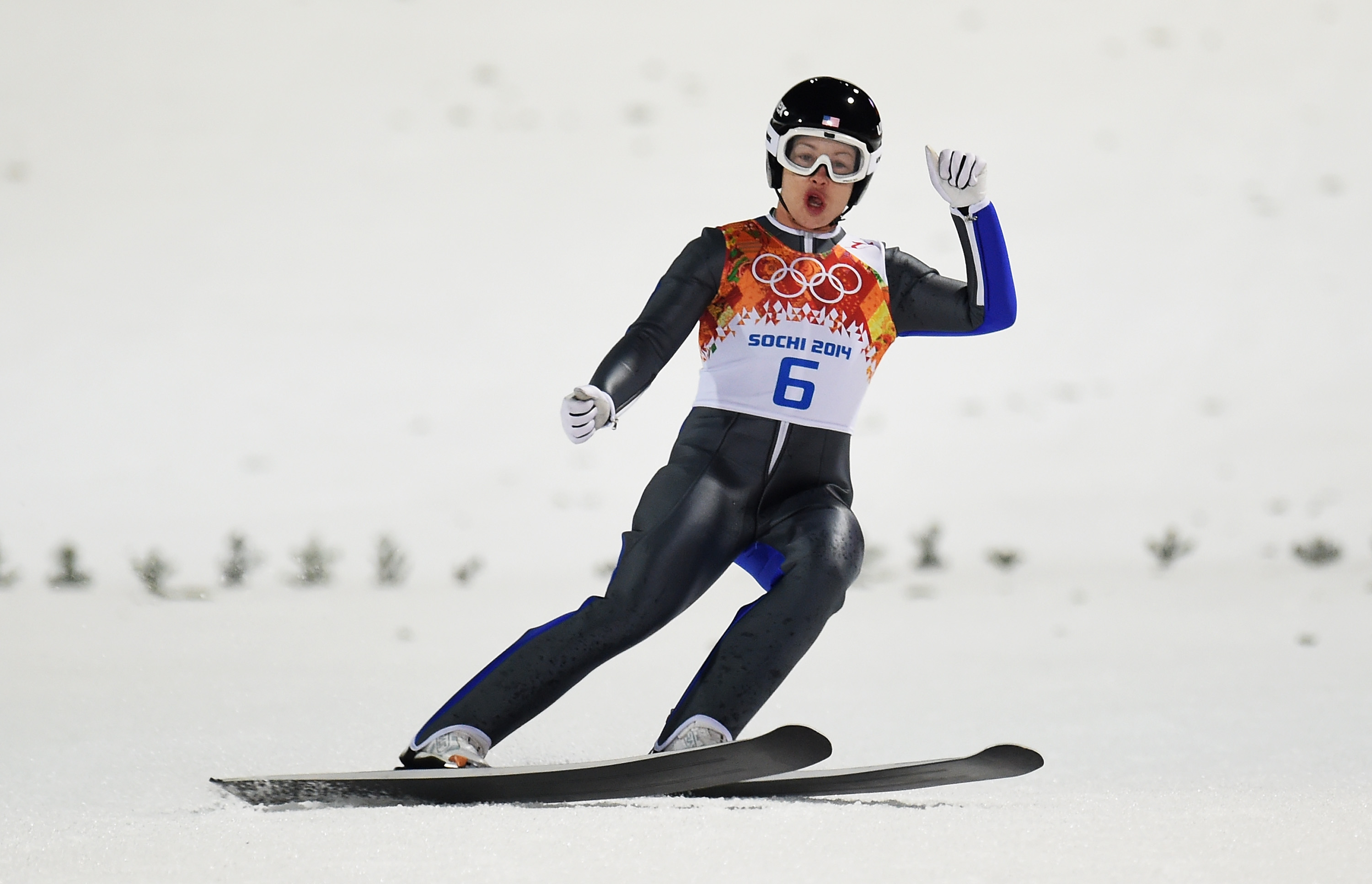 SOCHI, RUSSIA - FEBRUARY 11: Lindsey Van of the United States reacts during the Ladies' Normal Hill Individual first round on day 4 of the Sochi 2014 Winter Olympics at the RusSki Gorki Ski Jumping Center on February 11, 2014 in Sochi, Russia. (Photo by Lars Baron/Getty Images)