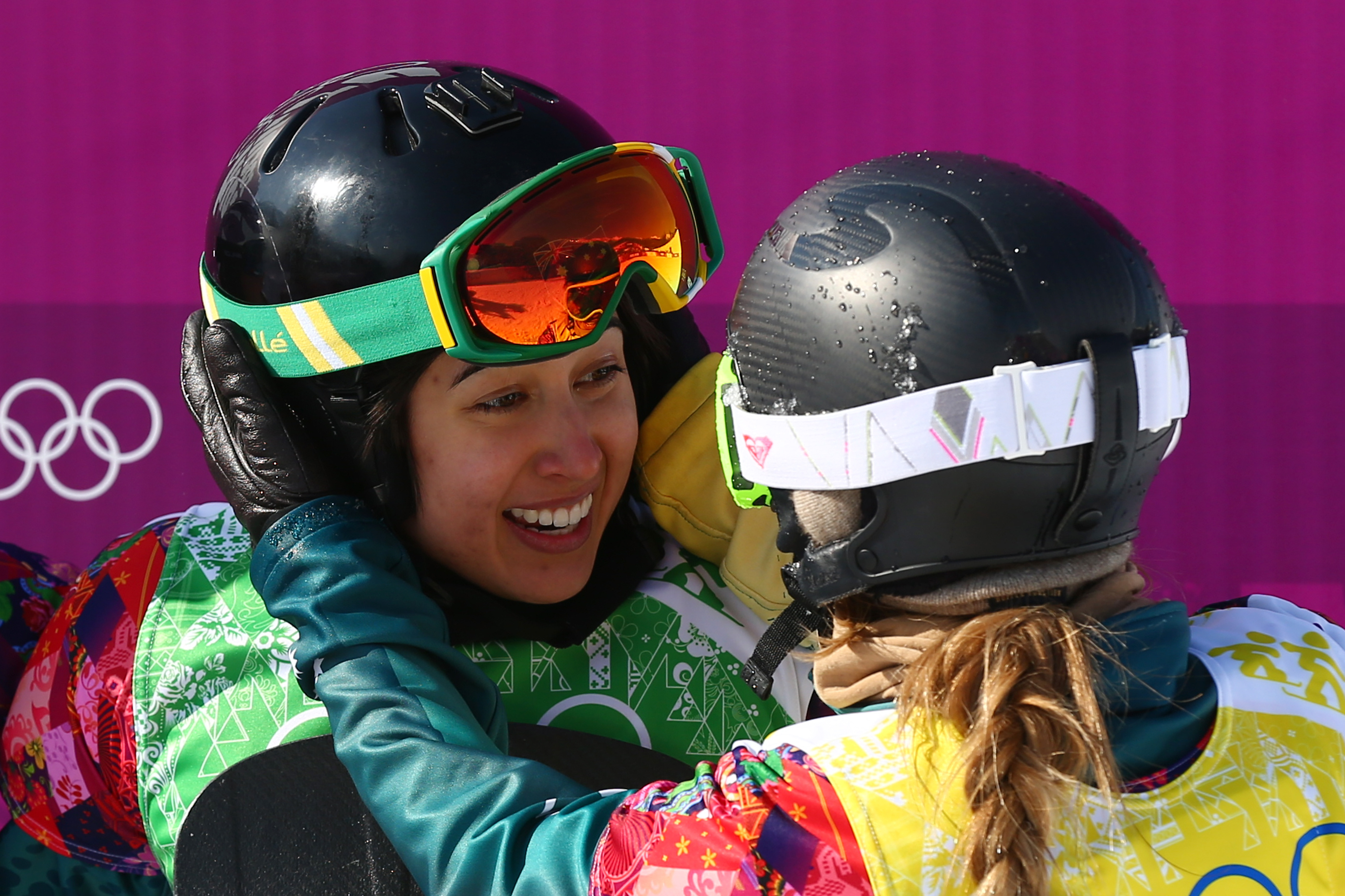 Belle Brockhoff (R) and Torah Bright of Australia jubilate after the Ladies' Snowboard Cross Quarterfinals on day nine of the Sochi 2014 Winter Olympics at Rosa Khutor Extreme Park on February 16, 2014 in Sochi, Russia. CREDIT: Cameron Spencer/Getty Images