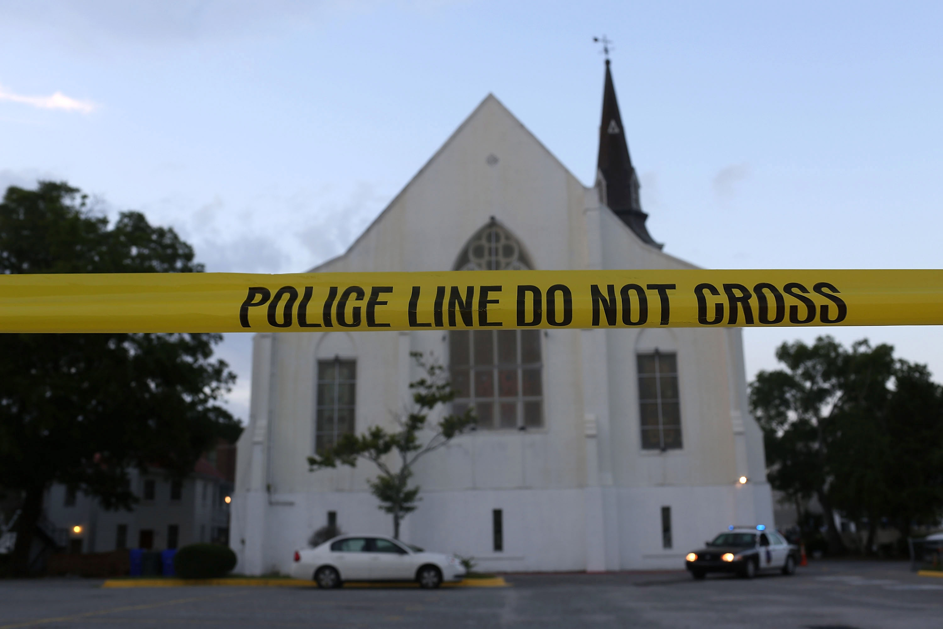 Police tape is seen near the Emanuel African Methodist Episcopal Church, in Charleston, South Carolina, after a mass shooting at the church killed nine people. CREDIT: Joe Raedle/Getty Images