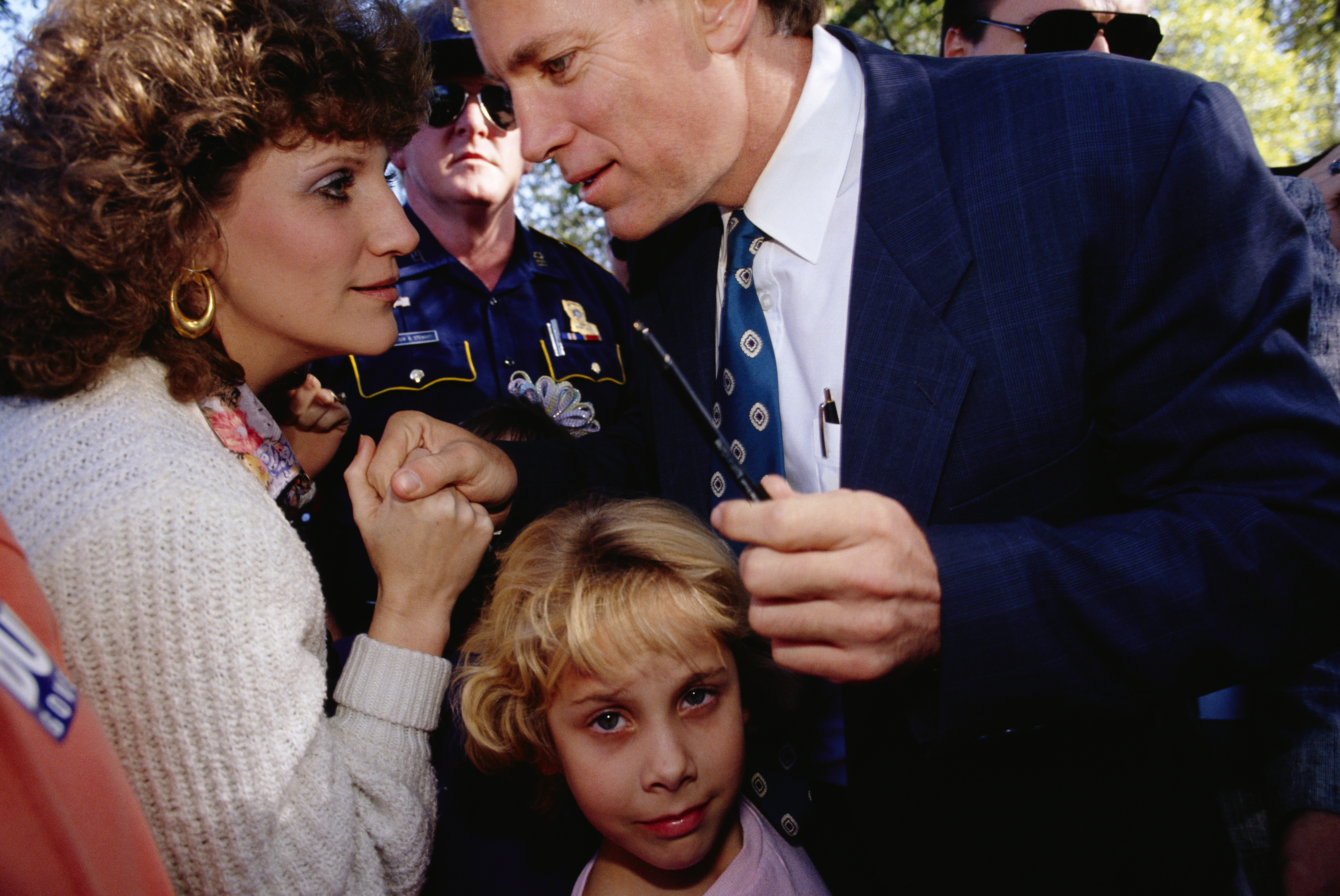 Politician David Duke speaks with a supporter while attending a barbecue in Hanesville, Louisiana. (CREDIT: Mark Peterson/Corbis via Getty Images)