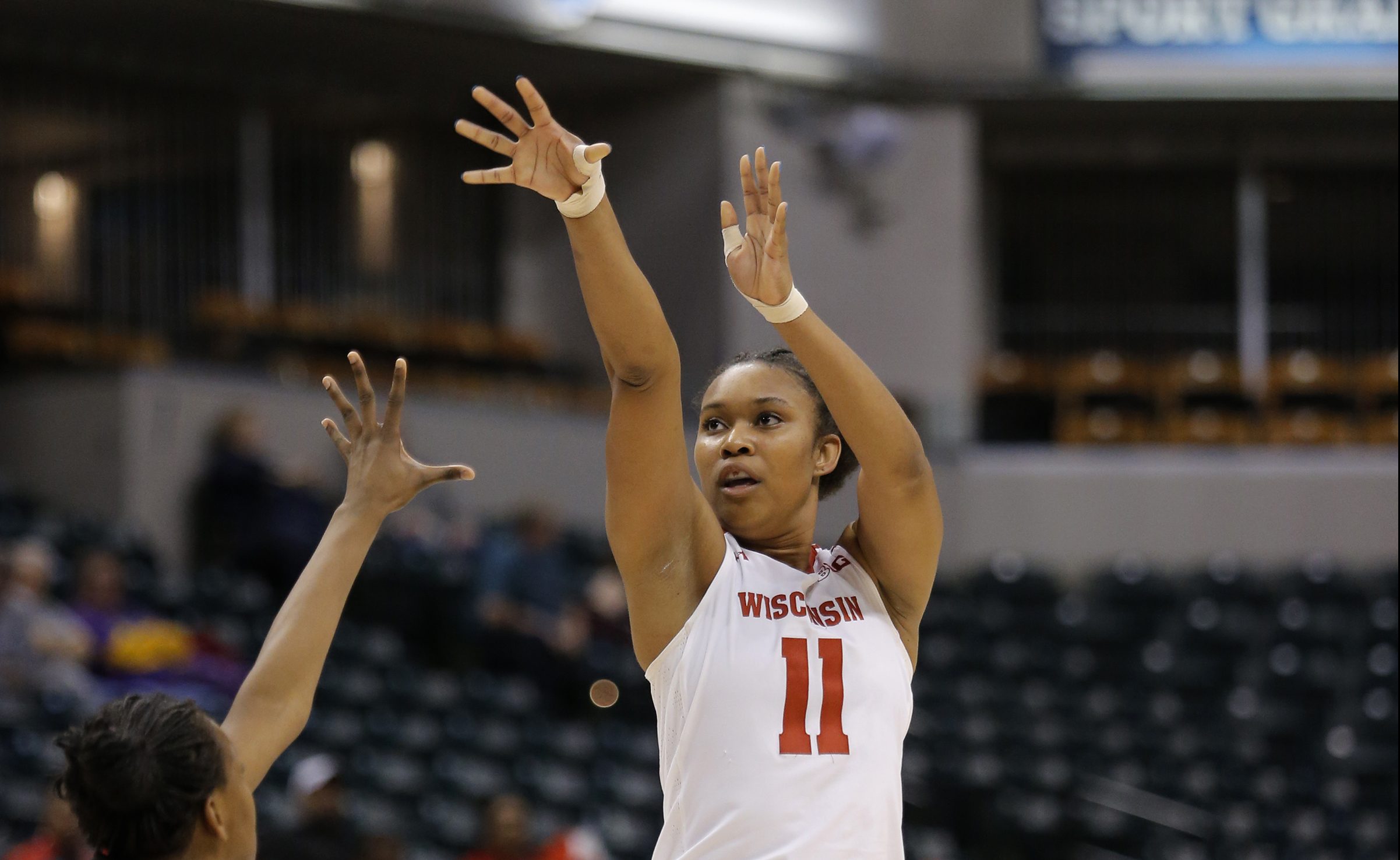 INDIANAPOLIS, IN - MARCH 01: Wisconsin Badgers forward Marsha Howard (11) fires up the jump shot over Rutgers guard Shala Glenn (11) during the game game between Rutgers Scarlet Knights vs Wisconsin Badgers on March 01, 2017 at Bankers Life Fieldhouse in Indianapolis, IN. Wisconsin defeated Rutgers 61-55. (Photo by Jeffrey Brown/Icon Sportswire via Getty Images)