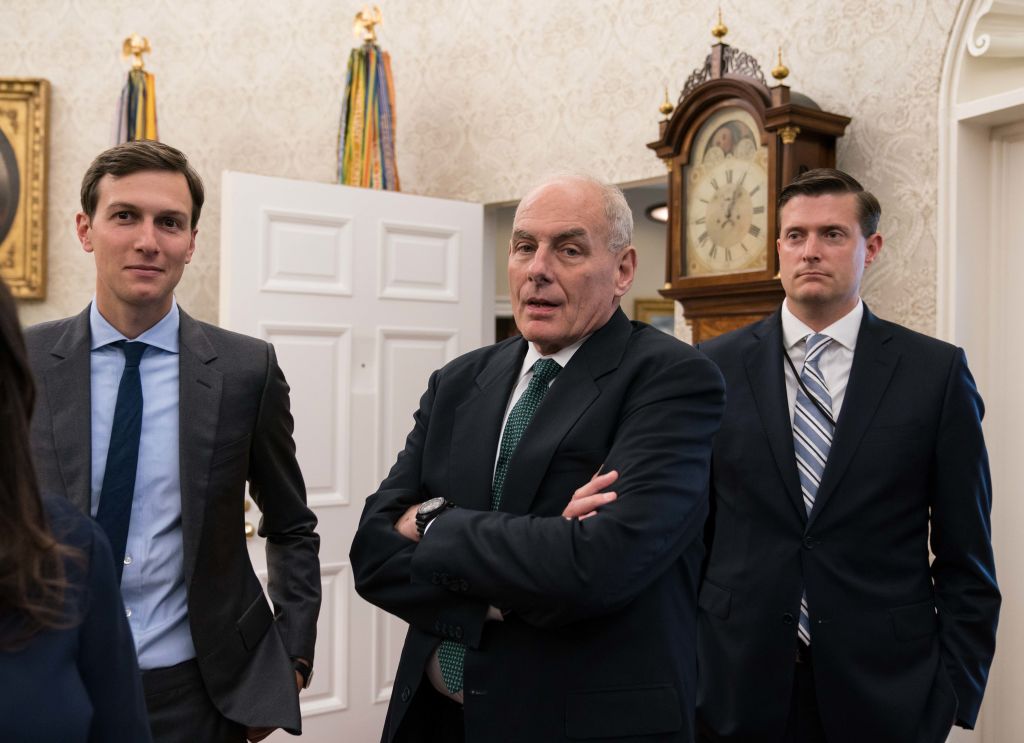 White House senior adviser Jared Kushner (L), White House chief of staff John Kelly (C) and former White House staff secretary Rob Porter in the Oval Office on September 1, 2017. CREDIT: NICHOLAS KAMM/AFP/Getty Images