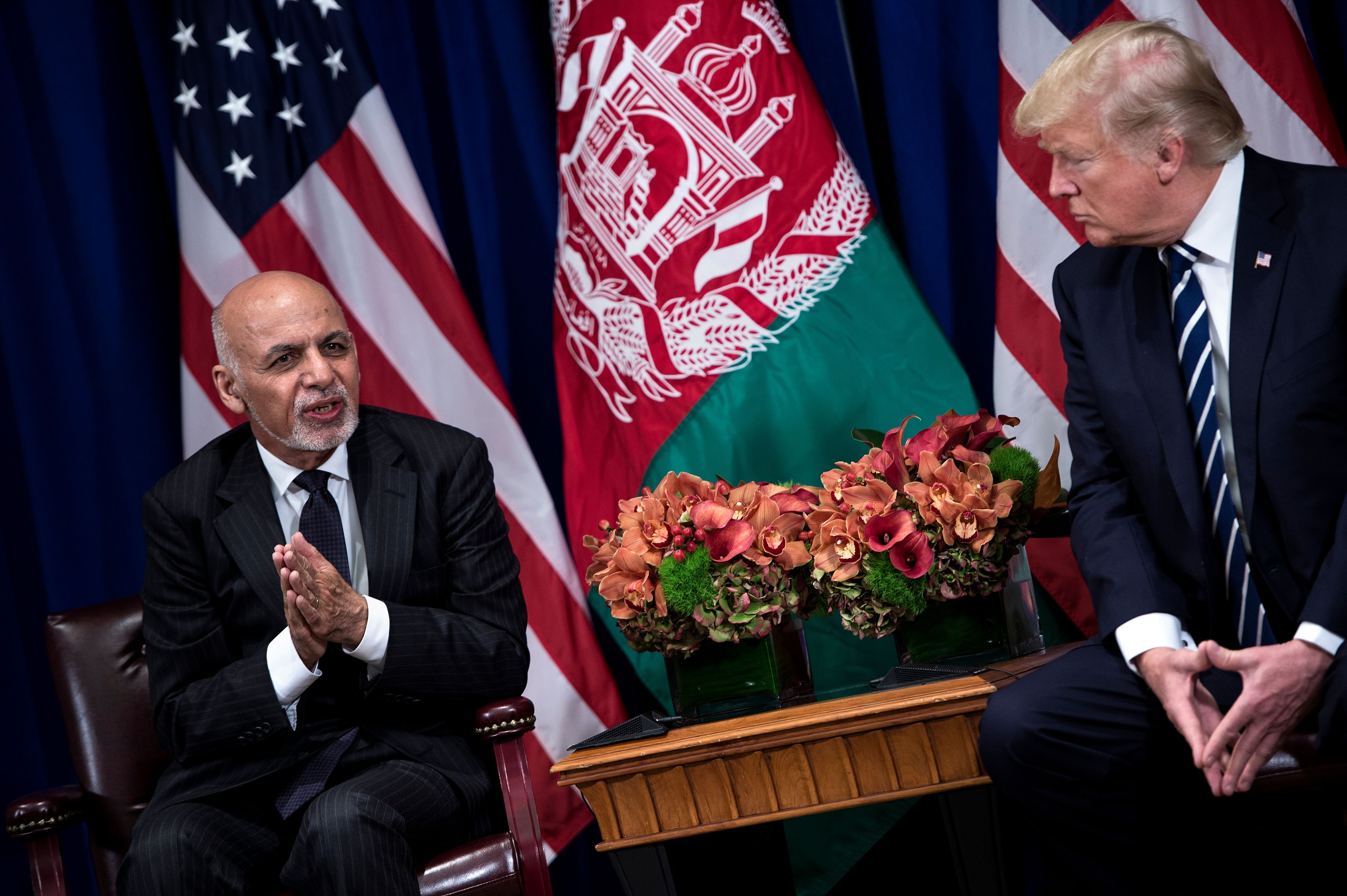 Afghanistan's President Ashraf Ghani makes a statement for the press as US President Donald Trump listens before a meeting at the Palace Hotel during the 72nd United Nations General Assembly September 21, 2017 in New York City. (Credit: BRENDAN SMIALOWSKI/AFP/Getty Images)