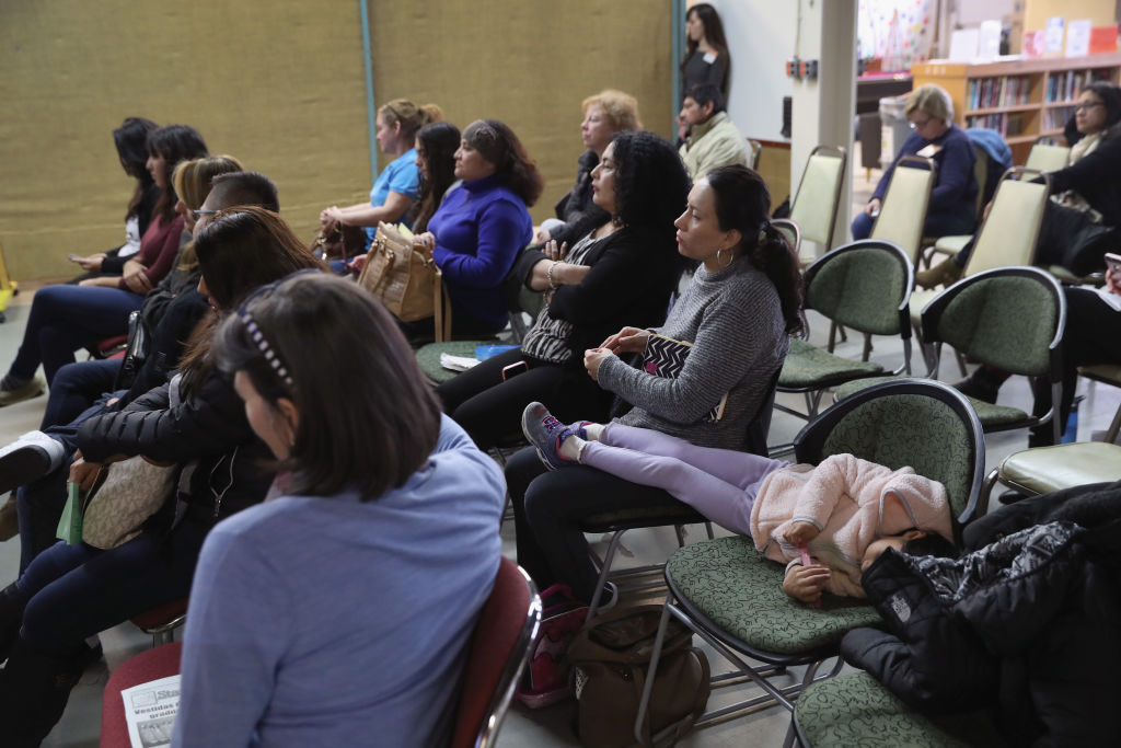 Immigrants attend a DACA and TPS workshop on January 27, 2018 in Stamford, Connecticut. (CREDIT: John Moore/Getty Images)
