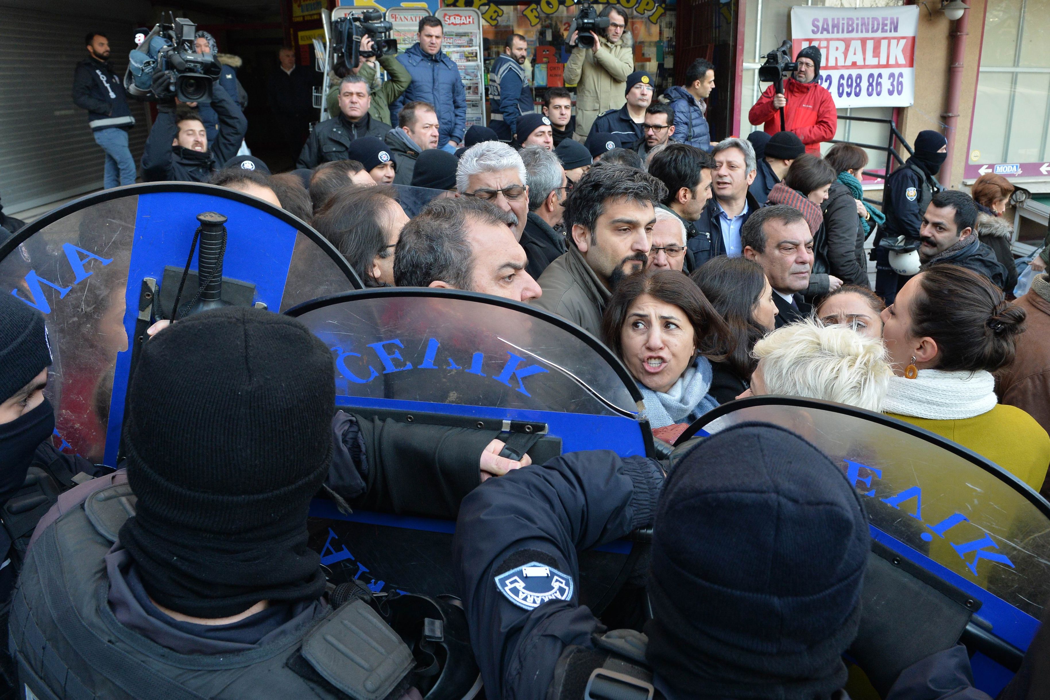 Turkish police clash with protestors following the arrest of members of a medical association that spoke out against Turkey's military offensive into an enclave in northwest Syria on January 30, 2018 in Ankara. CREDIT: Adem Altan/AFP/Getty Images.