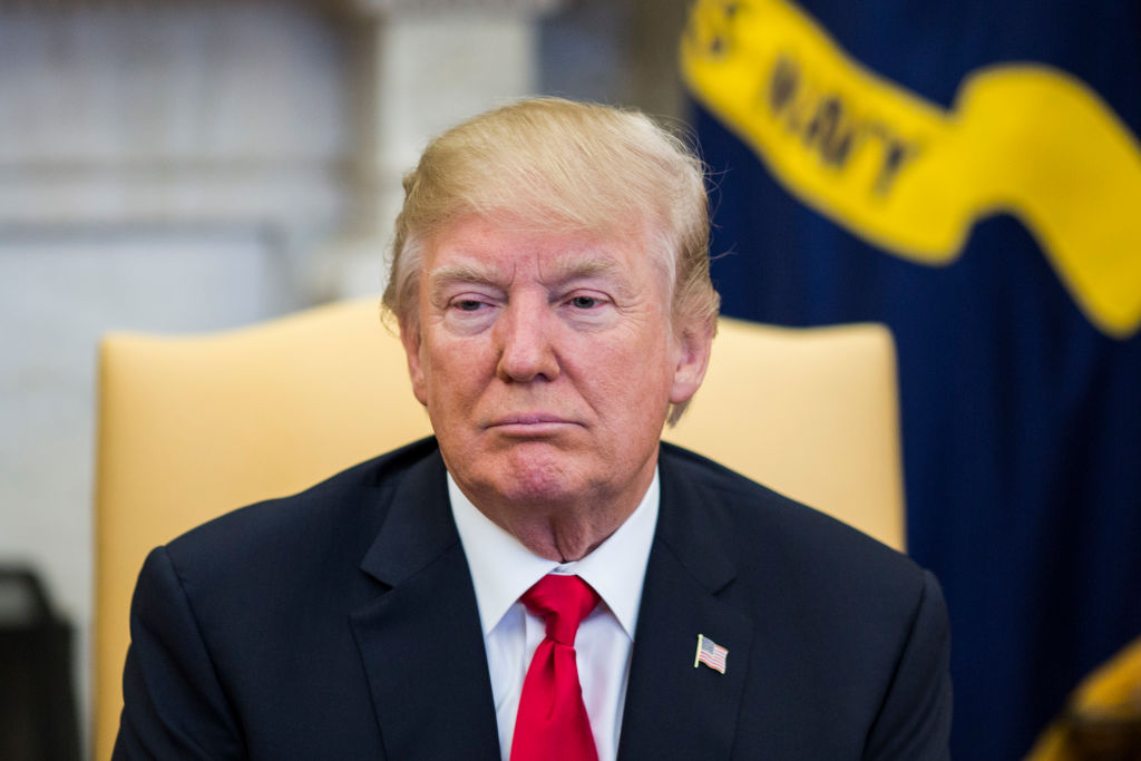 WASHINGTON, DC - FEBRUARY 02: U.S. President Donald Trump meets with North Korean defectors in the Oval Office of the White House on February 2, 2018 in Washington, D.C. Trump's meeting is one week before the Winter Olympics in Pyeongchang, South Korea in which North Korea will be participating. (Photo by Zach Gibson-Pool/Getty Images)