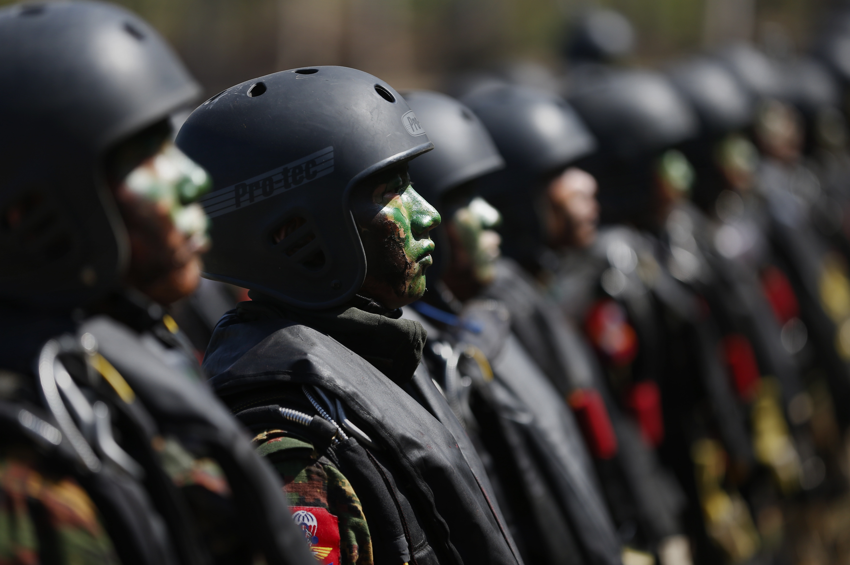 Myanmar miltary commandos stand in formation during the second day of 'Sin Phyu Shin' joint military exercises in Ayeyarwaddy delta region, on February 3, 2018. CREDIT: Lynn Bo Bo/AFP/Getty Images.