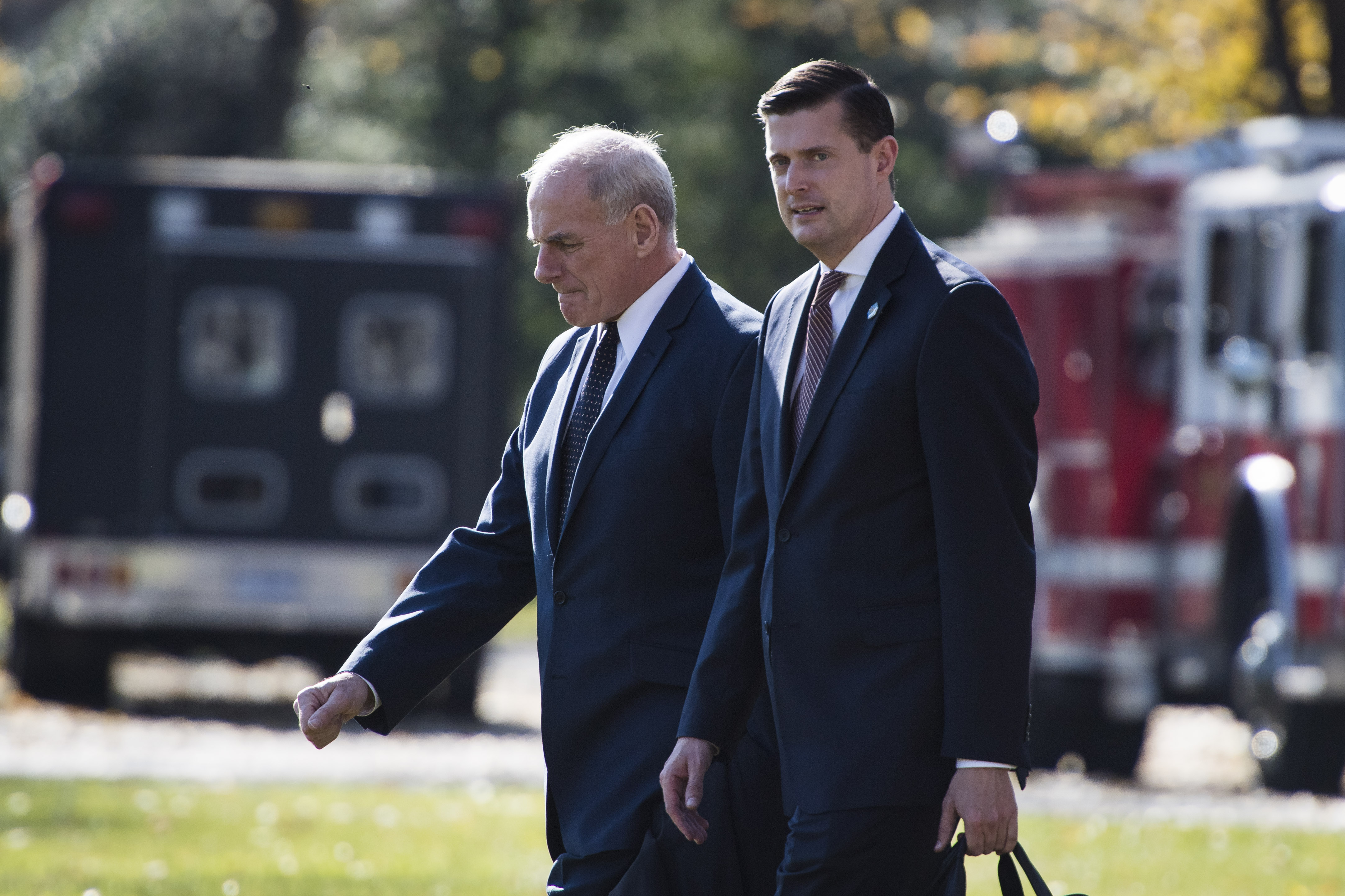 WASHINGTON, DC - NOVEMBER 29: White House Chief of Staff John Kelly and Staff Secretary Rob Porter follow President Donald Trump as he walks to board Marine One to head to Missouri to push the Republican tax plan, on the South Lawn of the White House in Washington, DC on Wednesday, Nov. 29, 2017. (Photo by Jabin Botsford/The Washington Post via Getty Images)