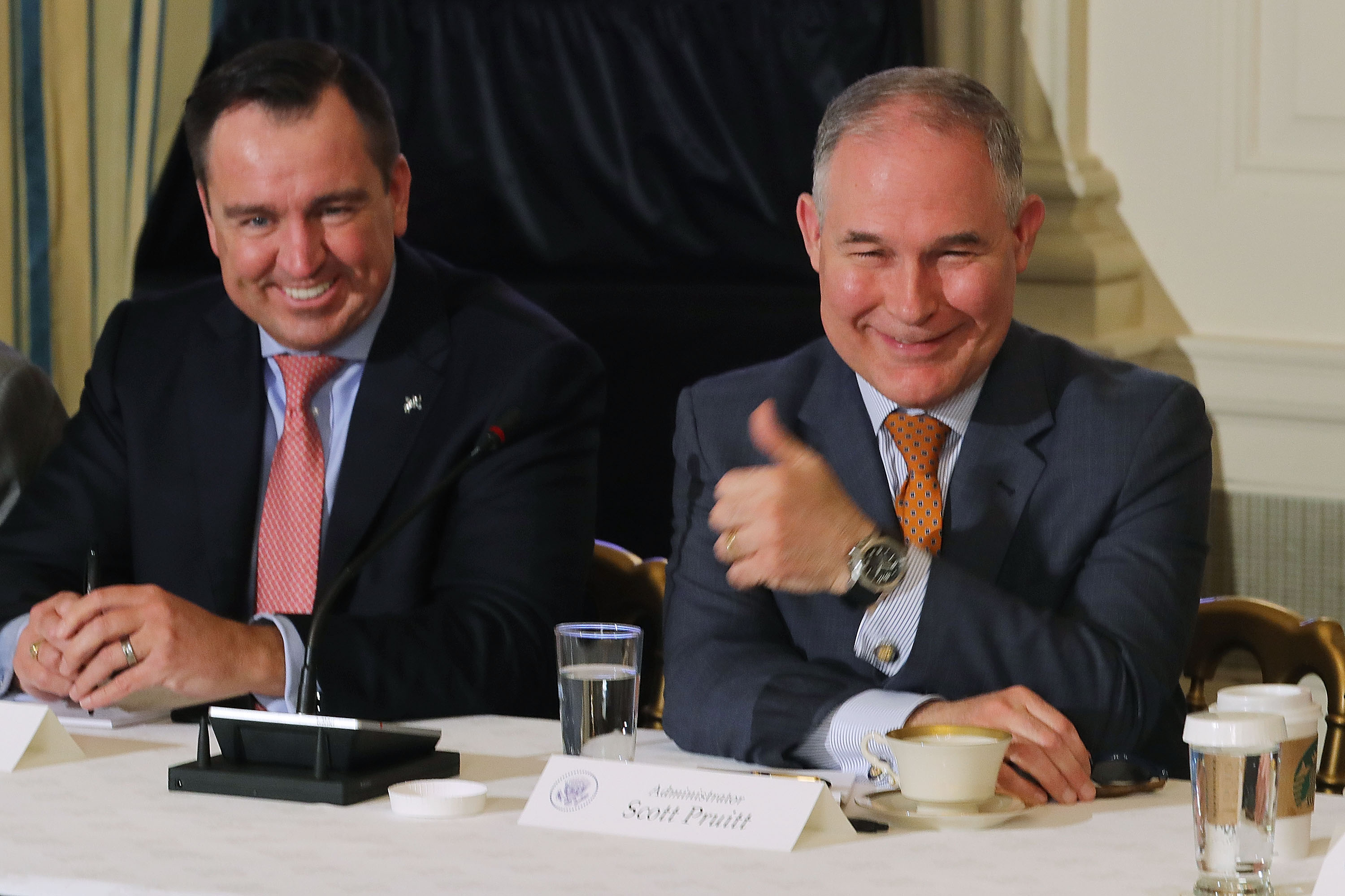 Environmental Protection Agency Administrator Scott Pruitt (R) gives a thumbs-up during a meeting on President Trump's infrastructure plan. (CREDIT: Chip Somodevilla/Getty Images)