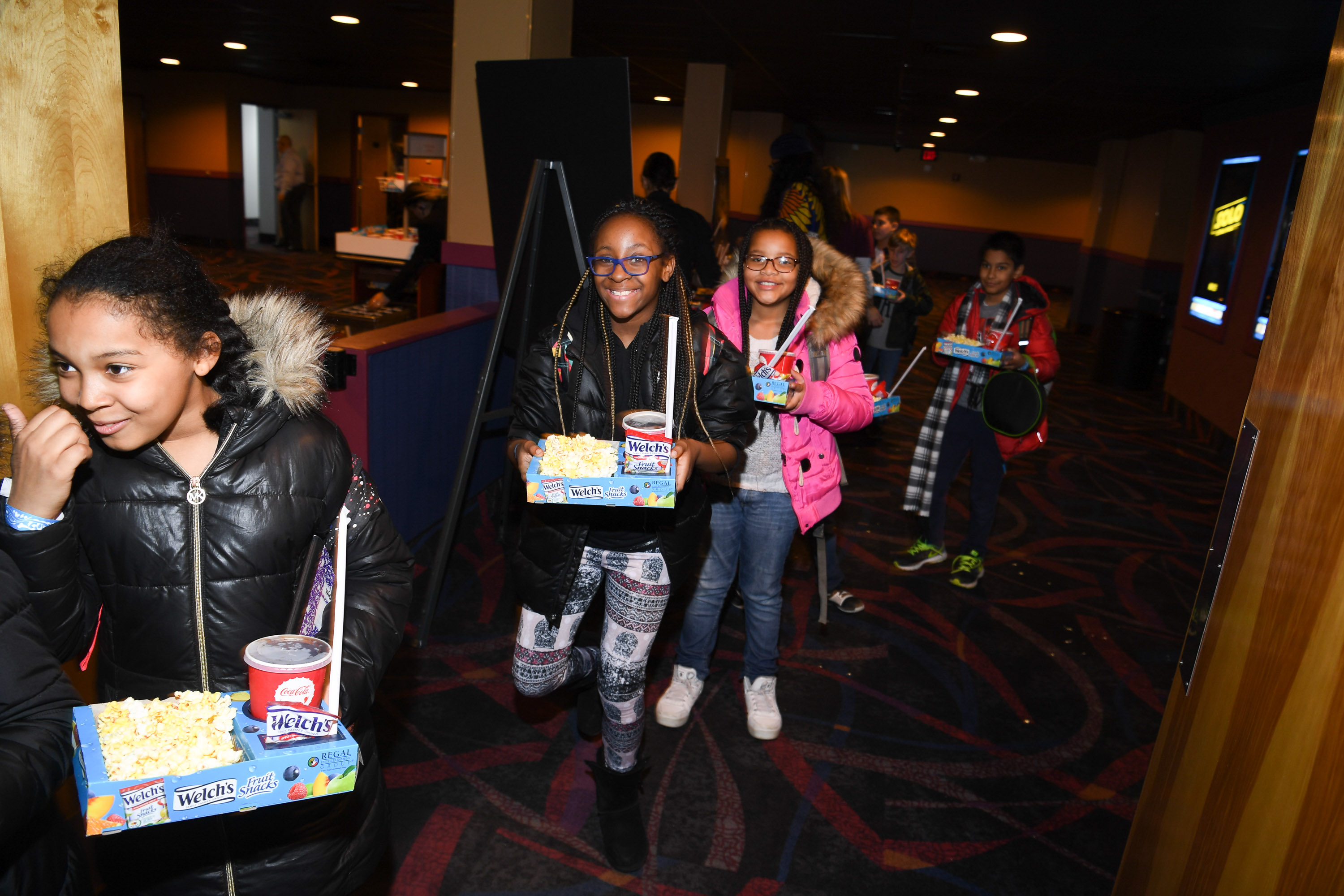 NEW ROCHELLE, NY - FEBRUARY 15: Boys & Girls Club New Rochelle members received the celebrity treatment with concessions and more during an advance IMAX screening of Black Panther on February 15, 2018 in New Rochelle, New York. (Photo by Dave Kotinsky/Getty Images for IMAX)