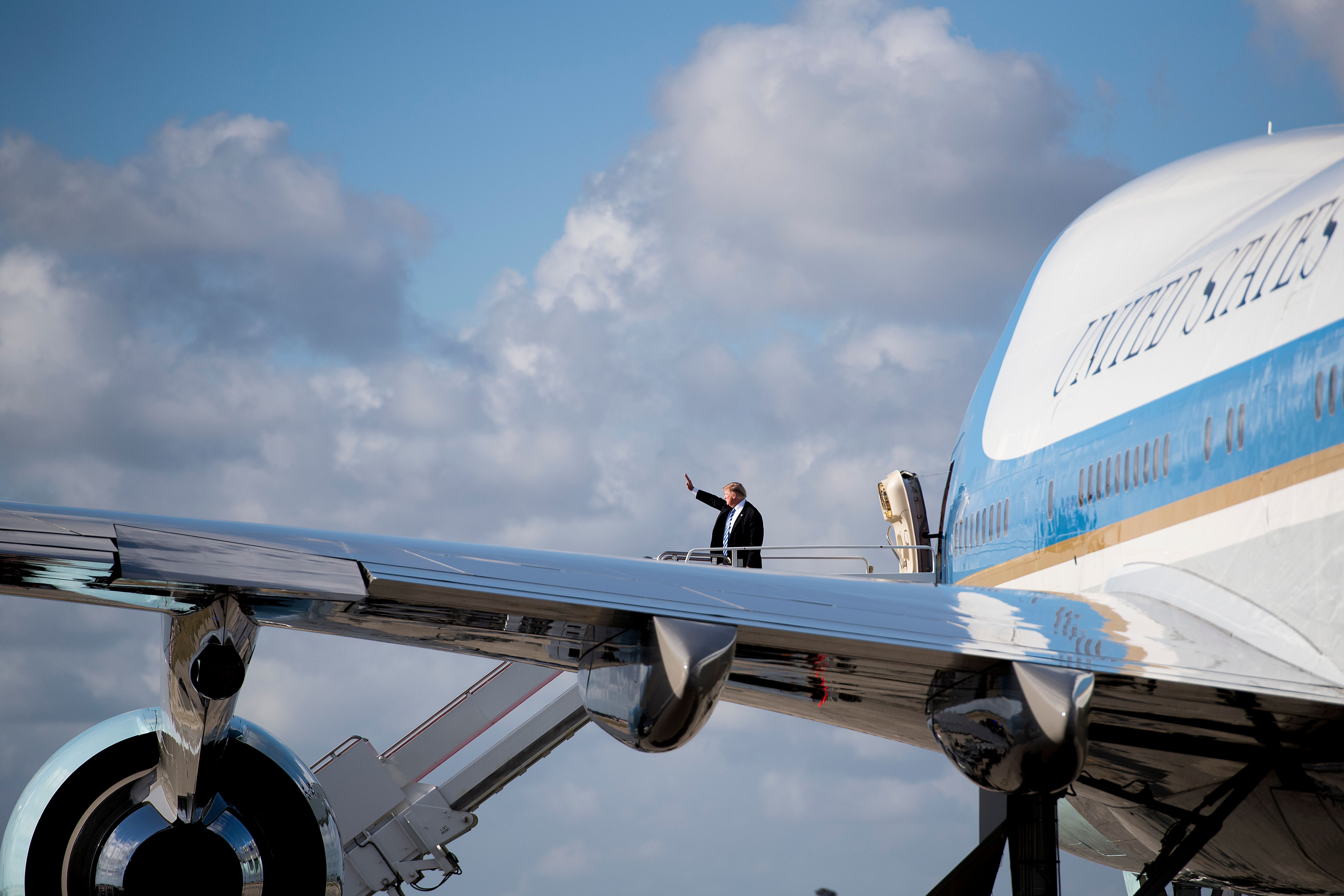 Trump boards Air Force One at Palm Beach International Airport in West Palm Beach, Florida, on SUNDAY. (CREDIT: JIM WATSON/AFP/Getty Images)