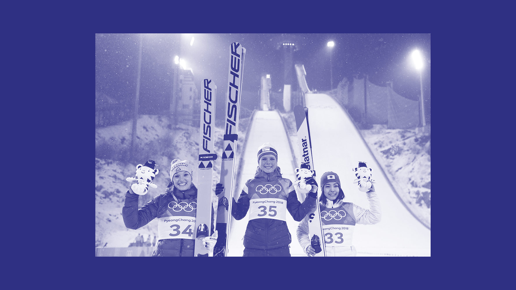 Silver medallist Germany's Katharina Althaus, gold medallist Norway's Maren Lundby and bronze medallist Japan's Sara Takanashi celebrate during the victory ceremony at the end of the women's normal hill individual ski jumping event during the Pyeongchang 2018 Winter Olympic Games on February 12, 2018, in Pyeongchang. Getty Images/ AFP PHOTO / Jonathan NACKSTRAND; Design by Diana Ofosu, ThinkProgress