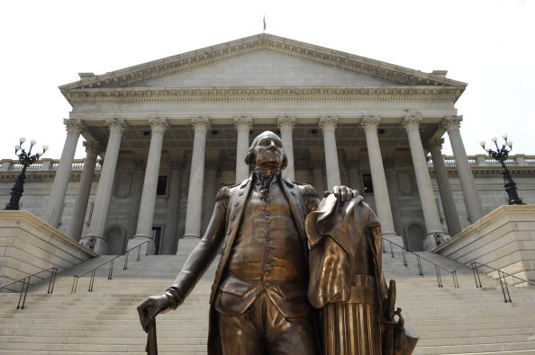 Members of the South Carolina Legislature received bogus emails in support of Dominion Energy's proposed acquisition of SCANA Corp. CREDIT: Davis Turner/Getty Images