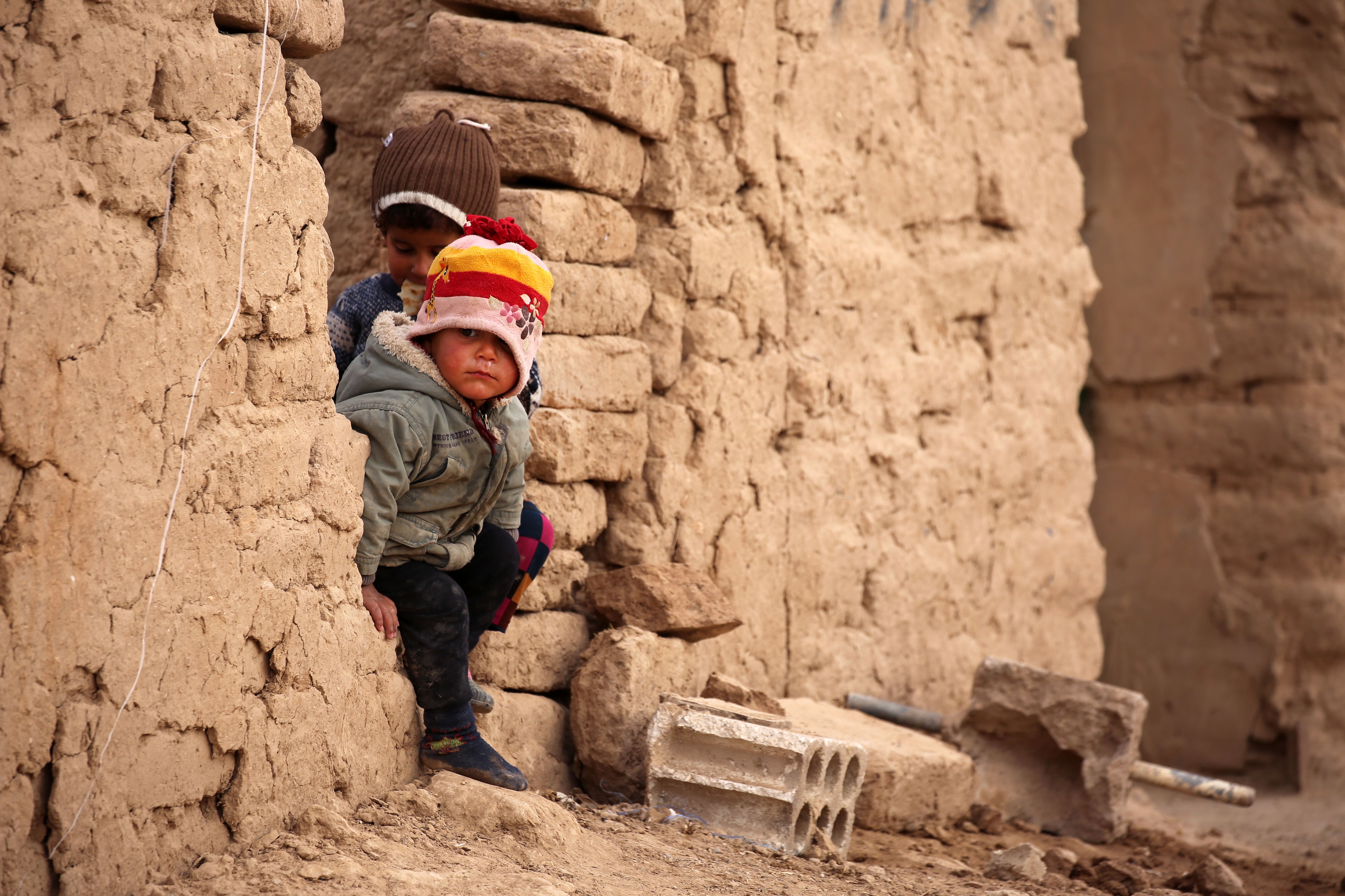 Iraqi refugee children who fled Mosul due to the fighting between government forces' and Islamic State play at the UN-run al-Hol refugee camp in Syria's Hasakeh province. CREDIT: SOULEIMAN/AFP/Getty Images