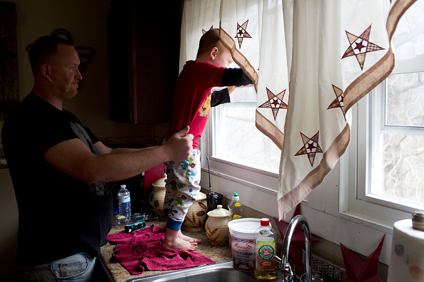 Unemployed coal miner Jereme Foster in his home in Noama, West Virginia. CREDIT: Andrew Lichtenstein/Corbis via Getty Images