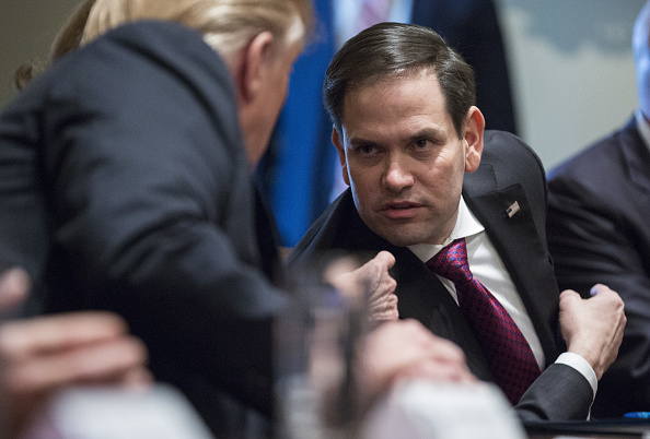Senator Marco Rubio speaks to U.S. President Donald Trump during a meeting with bipartisan members of Congress to discuss school and community safety in the Cabinet Room of the White House in Washington, D.C., on Wednesday, Feb. 28, 2018. (Credit: Joshua Roberts/ via Getty Images)