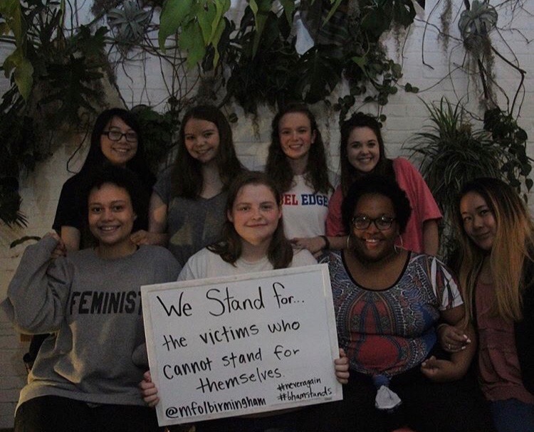 Ashley Causey (center) with other student activists. (CREDIT: Courtesy of Ashley Causey)