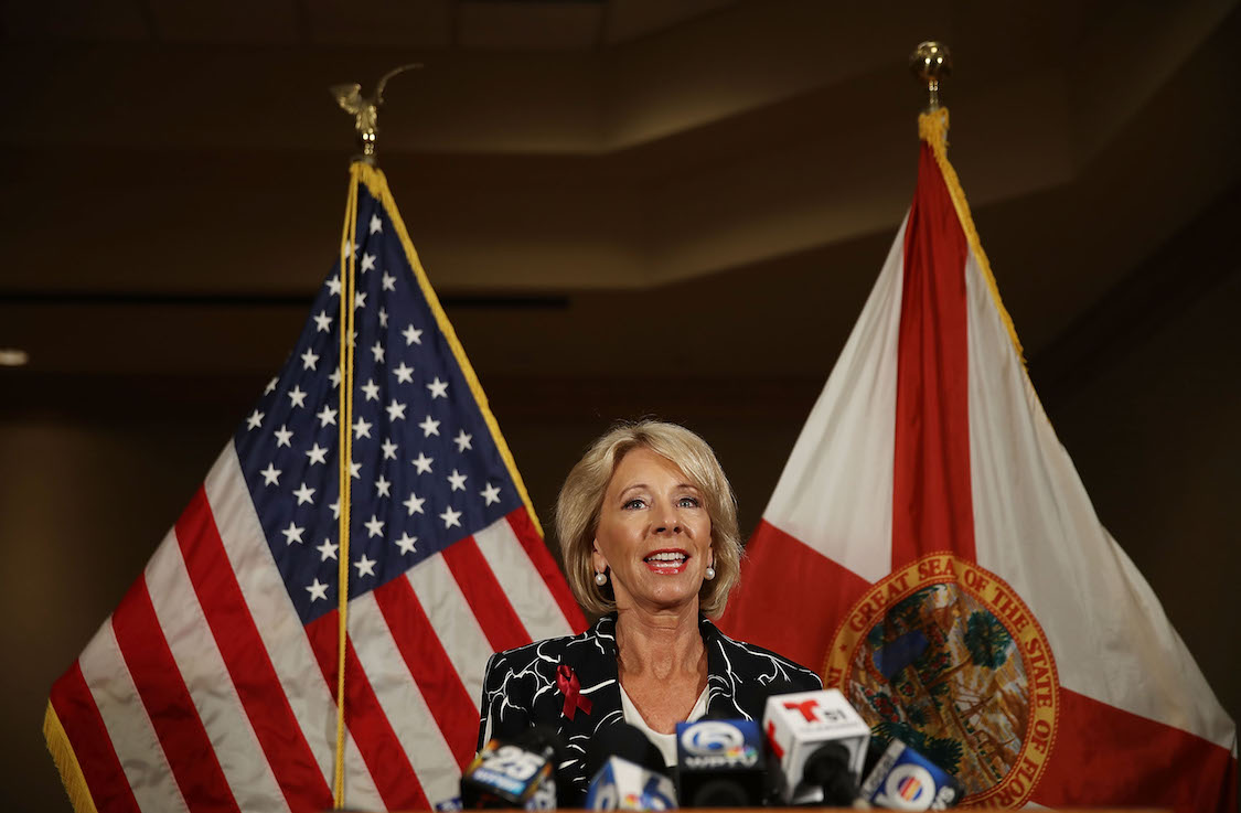 U.S. Education Secretary Betsy DeVos speaks to the news during a press conference held at the Heron Bay Marriott about her visit to Marjory Stoneman Douglas High School in Parkland, Florida. CREDIT: Joe Raedle/Getty Images
