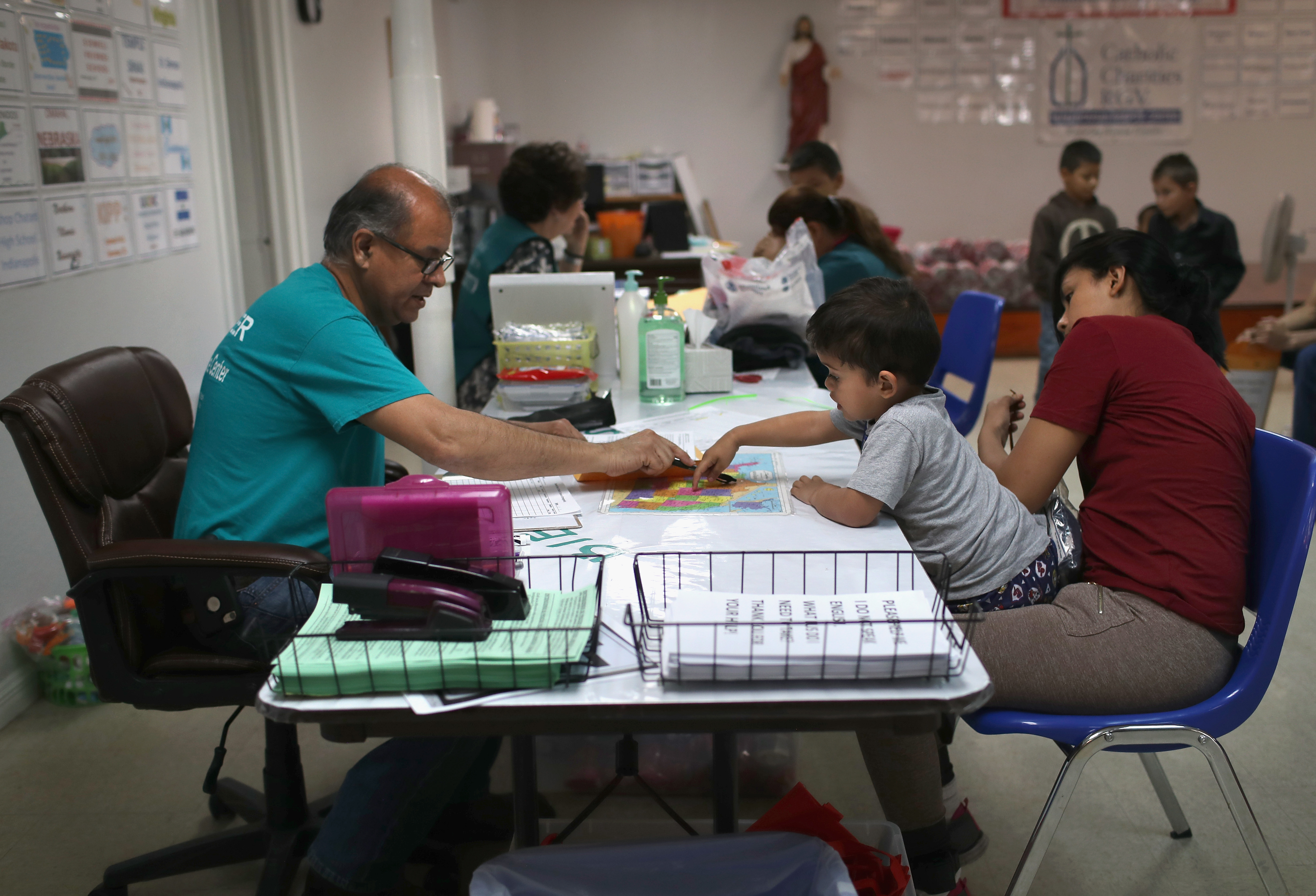MCALLEN, TX - FEBRUARY 23: Immigrant Respite Center staff receive Central American families after they were released from U.S. immigration officials on February 23, 2018 in McAllen, Texas. (Photo by John Moore/Getty Images)