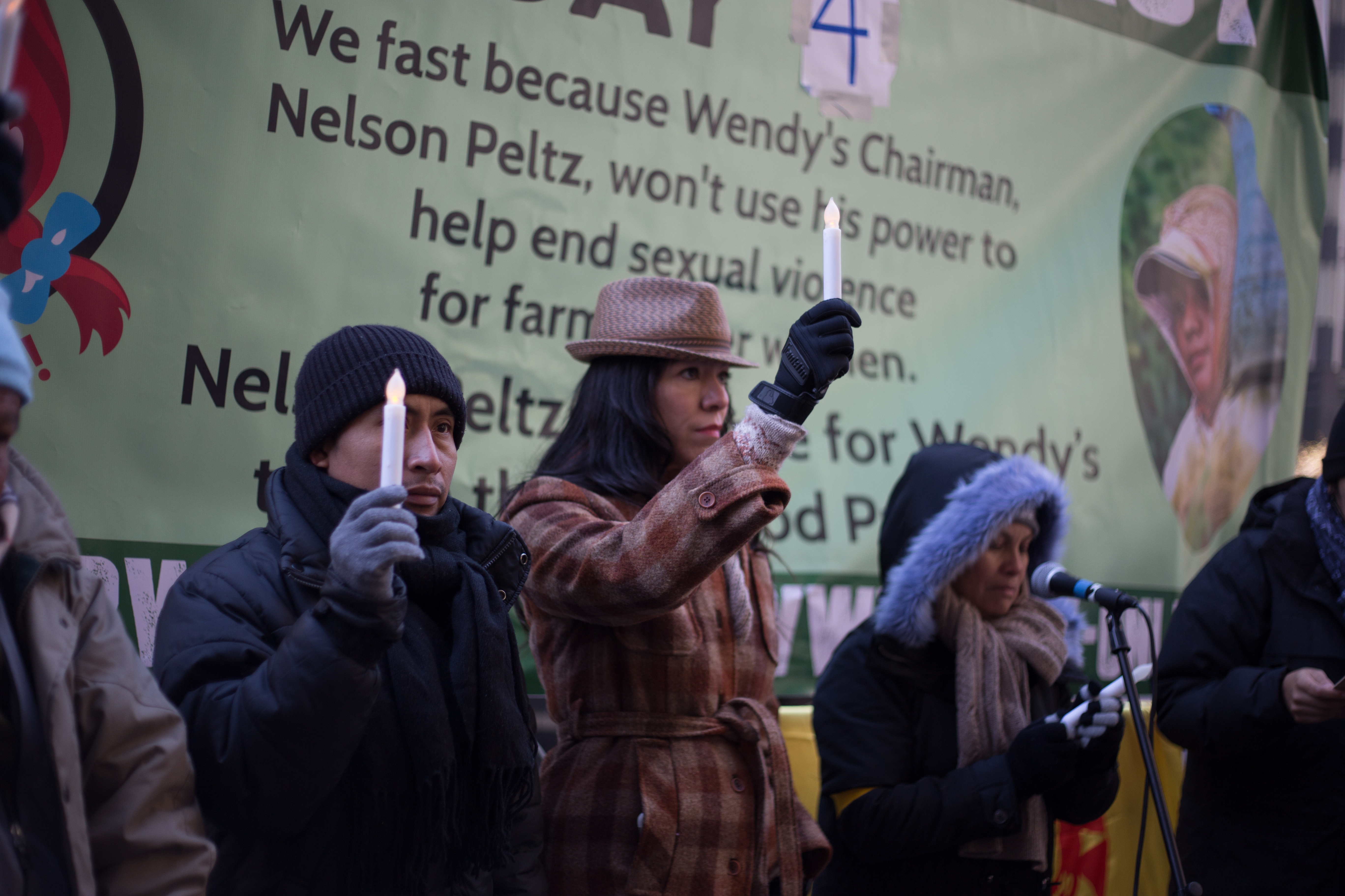 Protesters in New York City hold candles on day four of the protests against Wendy's refusal to join the Fair Food Program. (Credit: Coalition of Immokalee Workers)