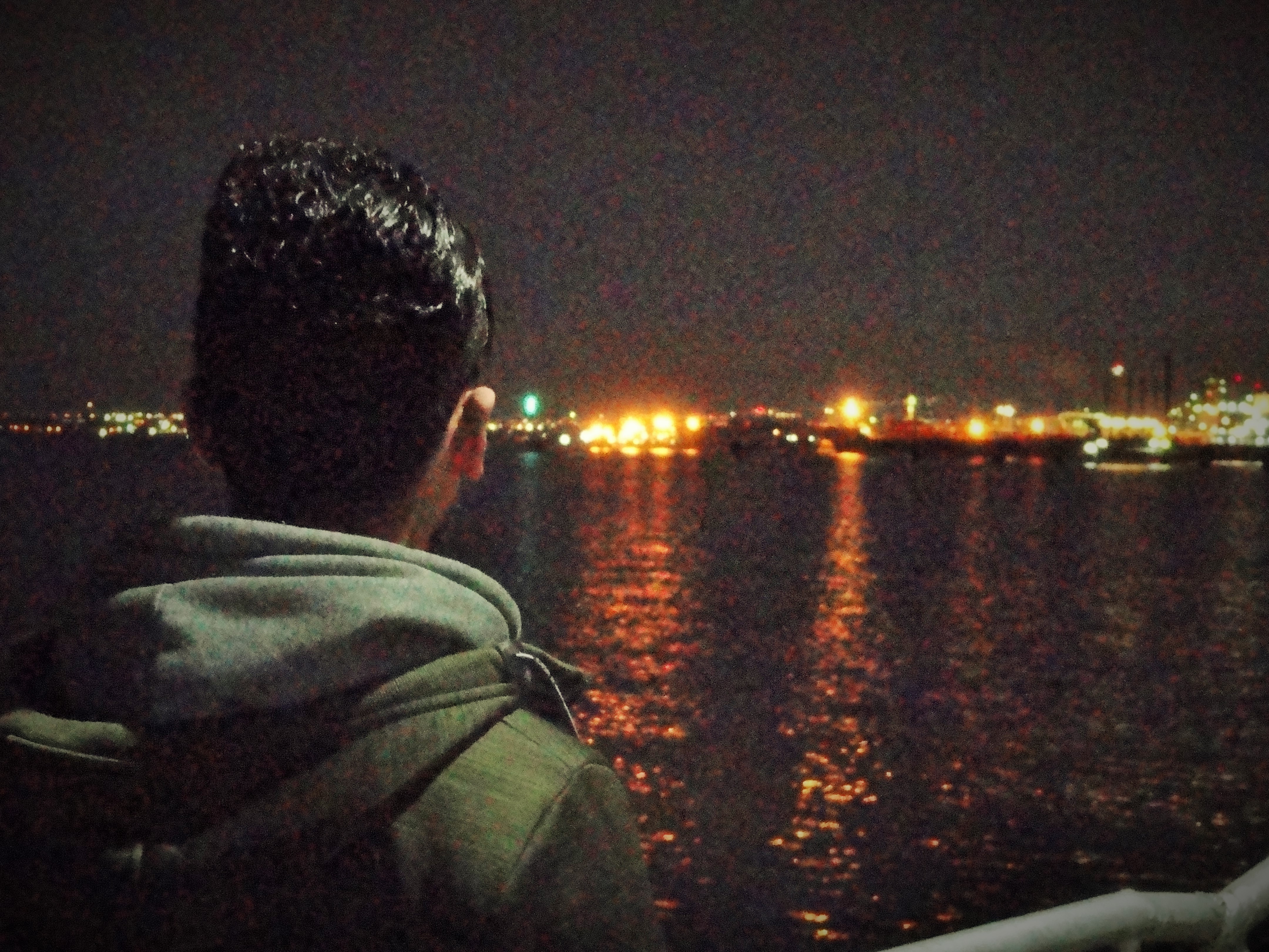 Suhel, 22, is a Syrian asylum seeker living on the mainland in Greece. Here, he's at the Skaramagas camp, just outside Athens, visiting his brother, Soleiman, who has been rejected for asylum and faces deportation. (CREDIT: D.Parvaz/ThinkProgress)