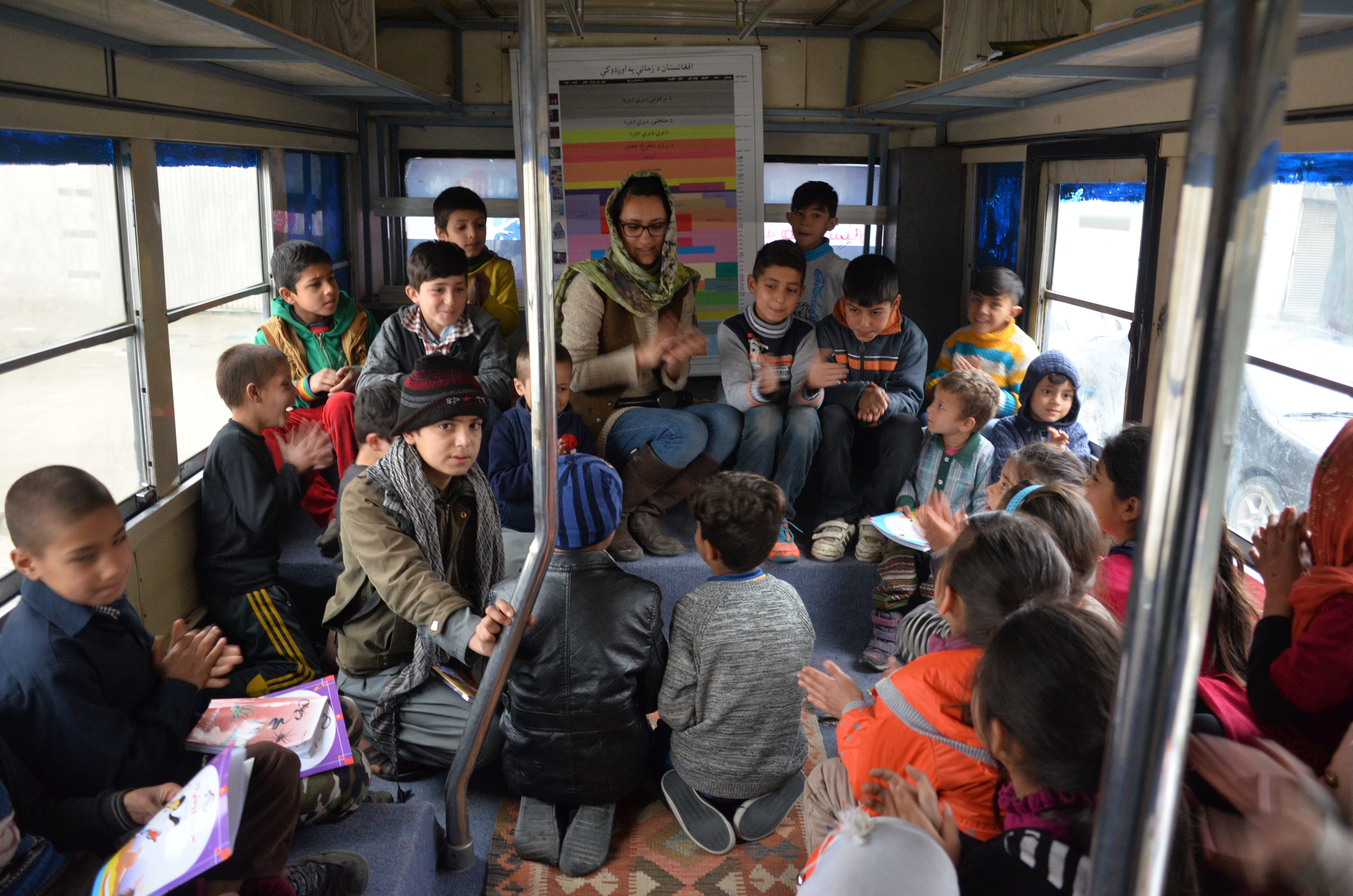 Freshta Karim speaks to a group of youth at the Charmaghz library. (credit: Ali M. Latifi for ThinkProgress)