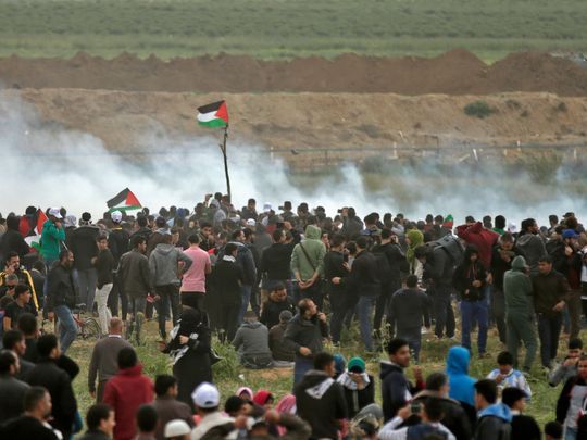 Palestinians take part in a demonstration on March 30, 2018, commemorating Land Day near the border with Israel east of Gaza City. (Photo: Mahmud Hams, AFP/Getty Images)