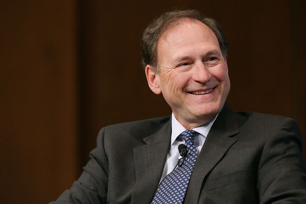 Conservative Justice Samuel Alito smiles. (Photo by Chip Somodevilla/Getty Images)