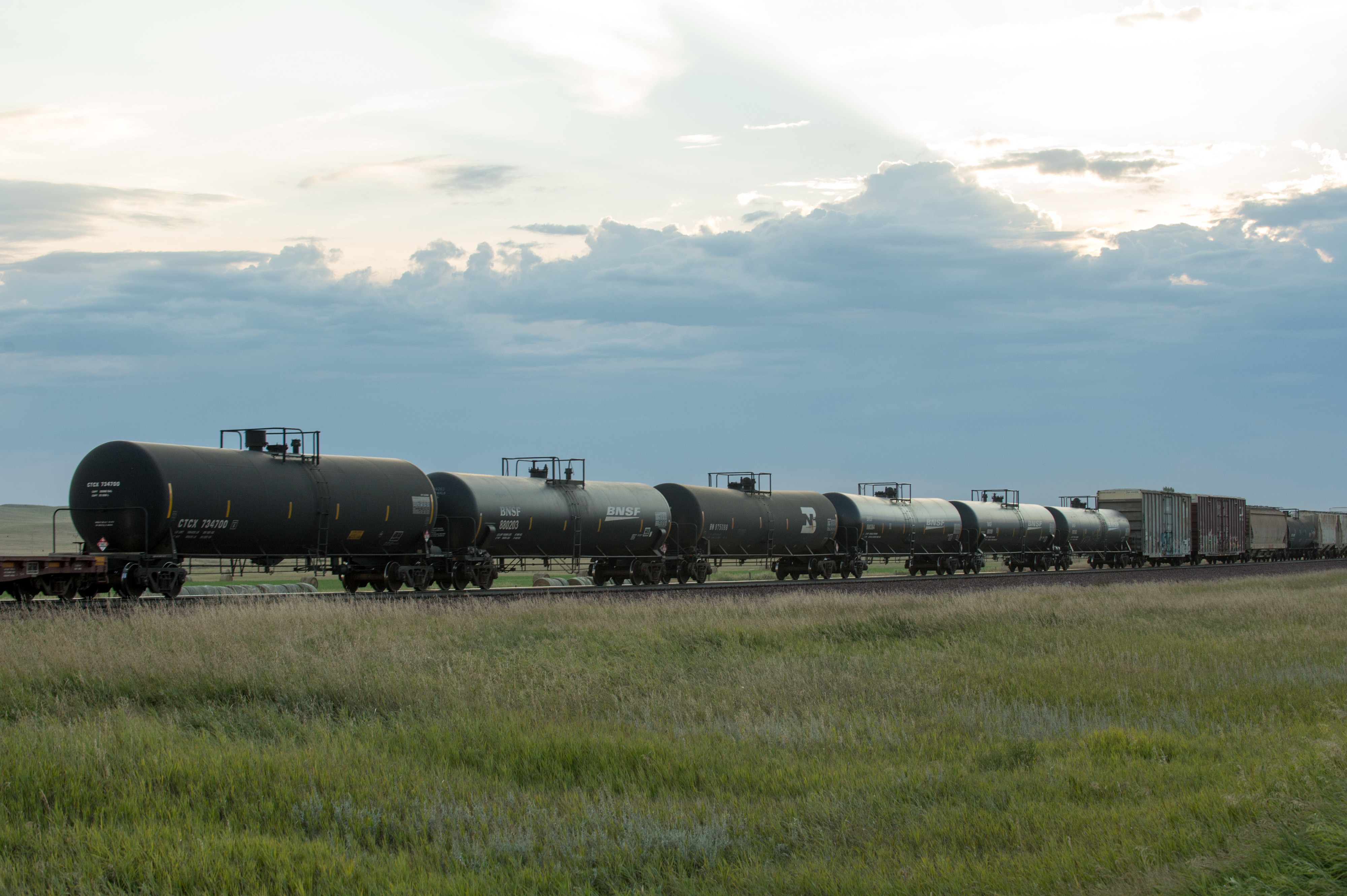 A train hauling oil tank cars heads east near Culbertson, North Dakota. (CREDIT: Ken Cedeno/Corbis via Getty Images)